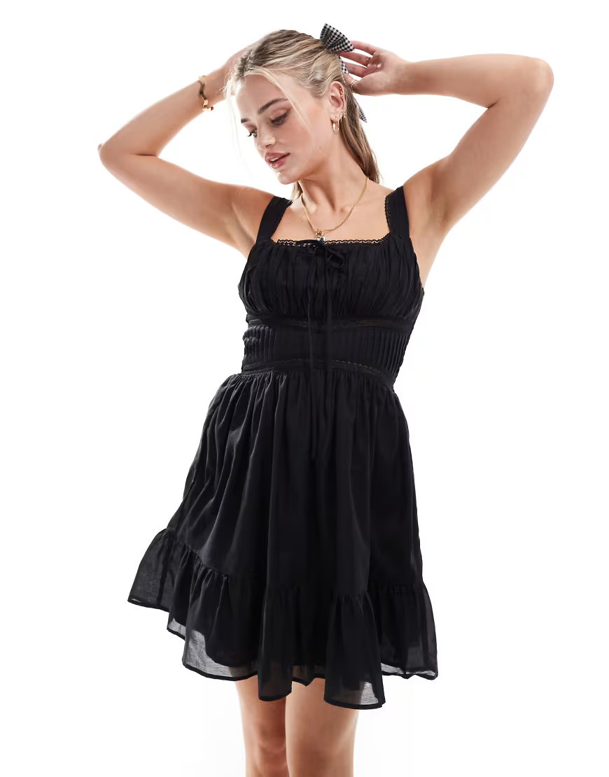 ASOS DESIGN lace trim bust mini sundress in black | ASOS (Global)