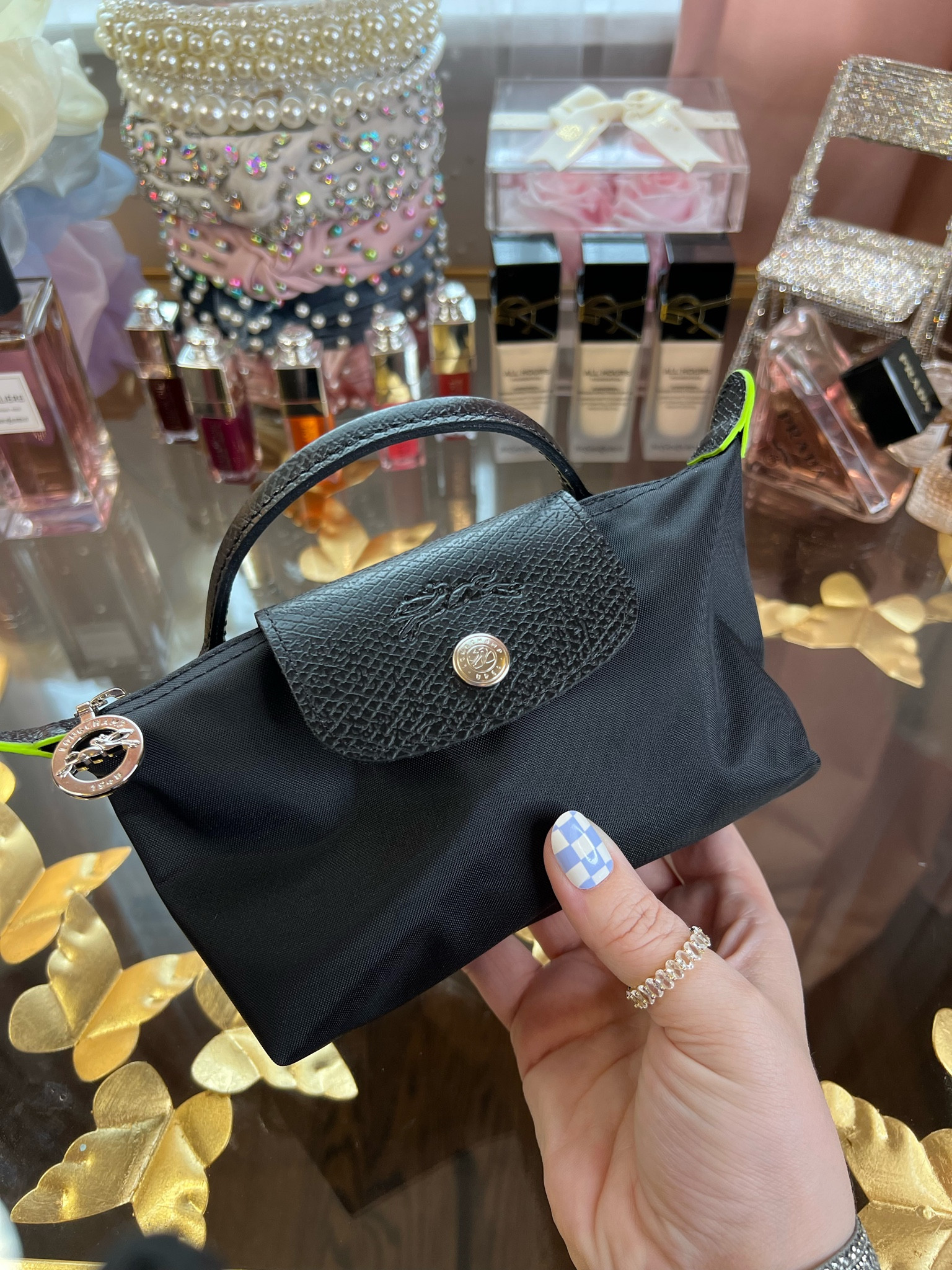 Longchamp Mini Pouch Bag

#LTKitbag #LTKunder100 #LTKstyletip