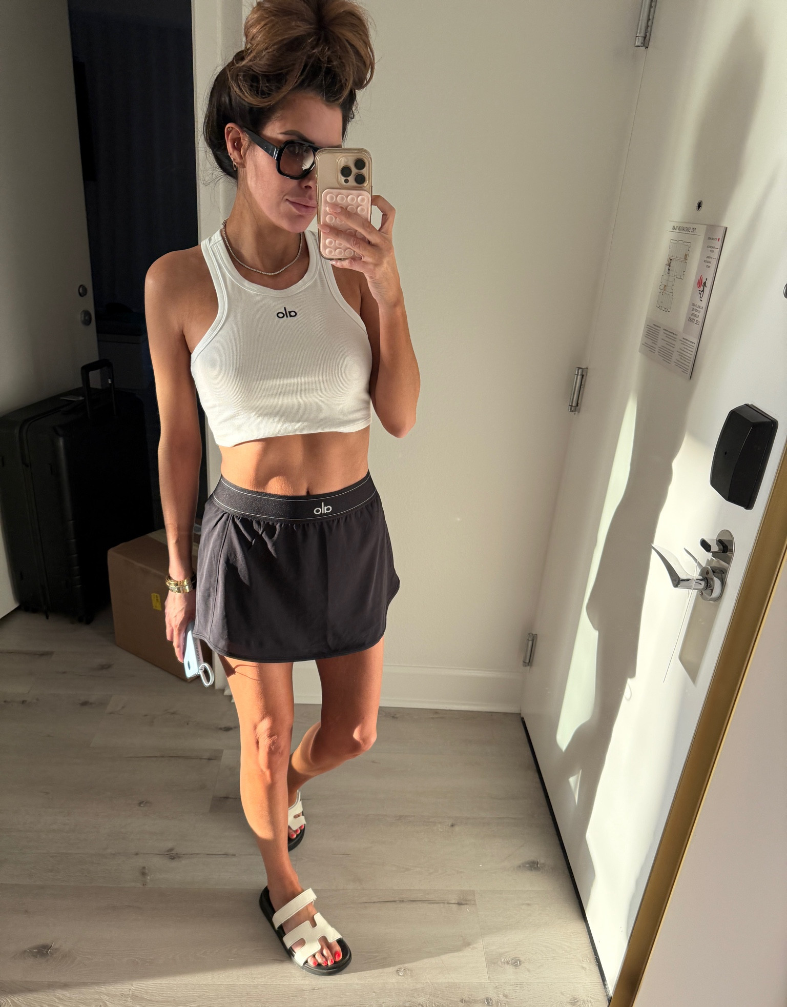 Wearing size small in alo skort & tank