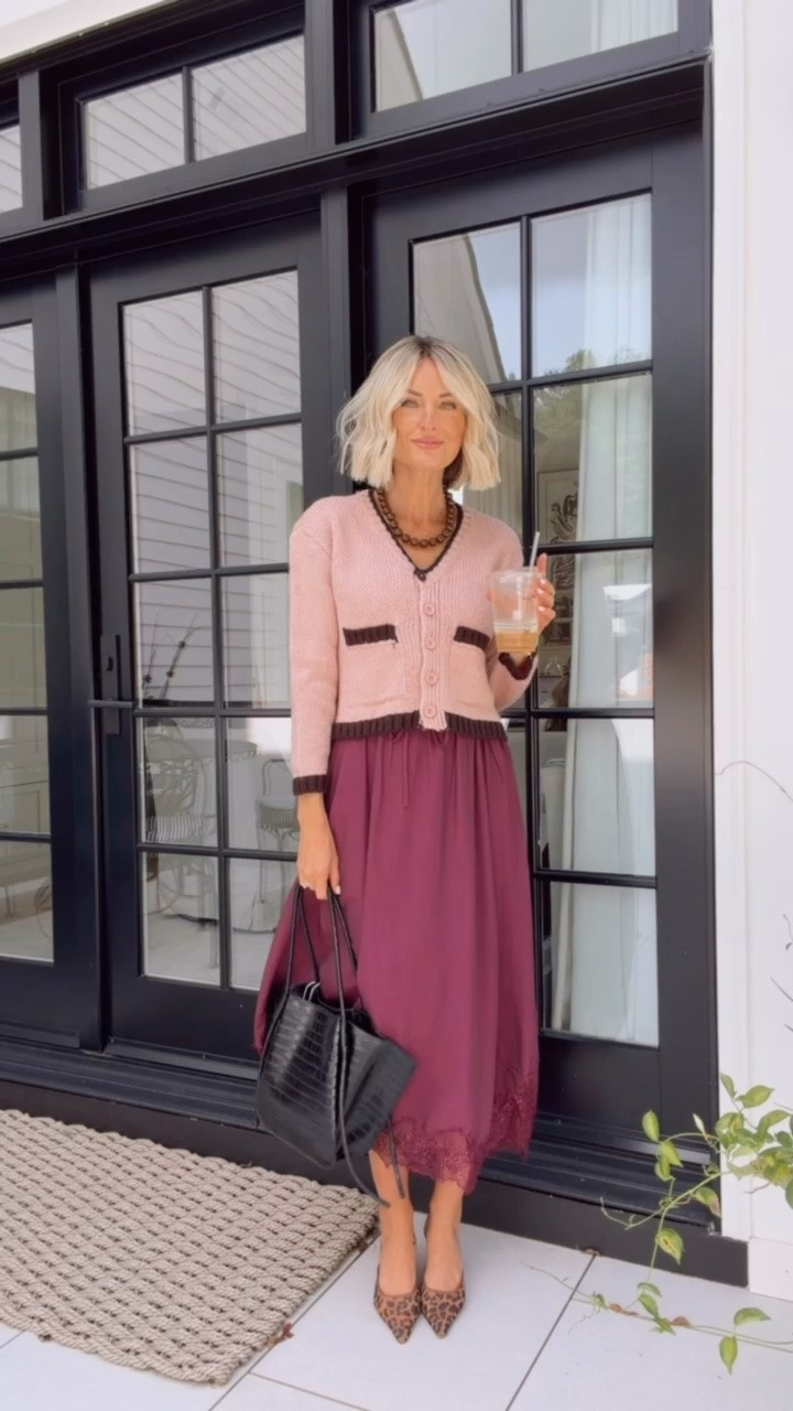 The lace trim on this skirt and the brown trim on this pink cardigan is 😍 I am obsessed! Wearing XS in both 

Loverly grey, Anthropologie finds, burgundy satin skirt outfit, pink cardigan outfit, fall outfit ideas, cheetah leopard heels how to style

#LTKootd #LTKSeasonal