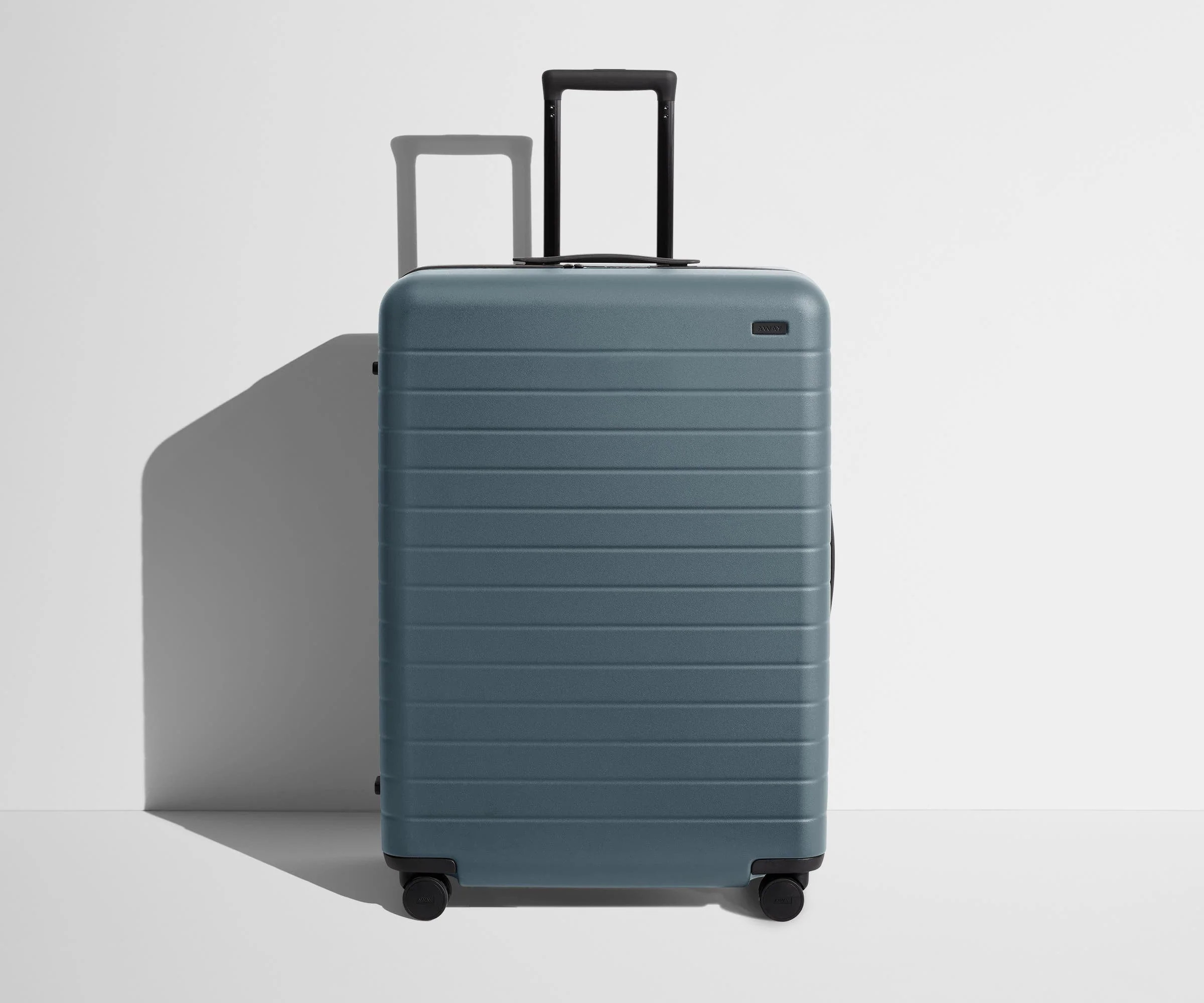 Shop Large & Checked Suitcases in Coast Blue | Away | Away
