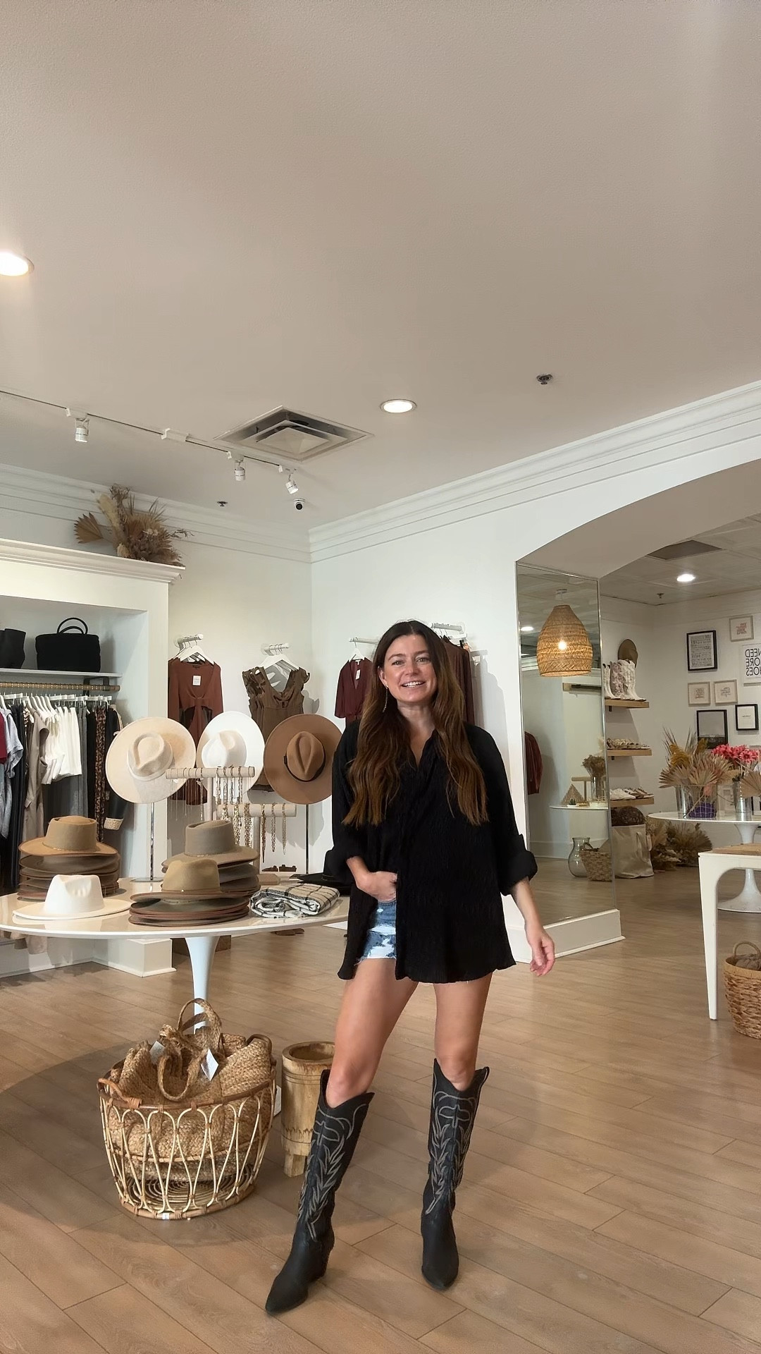 OOTD at the shop! 🖤 This weeks vibe is relaxed/over-sized tops, short shorts, and  boots. My go-to style anytime I’m bloated and/or looking for a laid back cool look. 

#LTKOver40 #LTKPetite
