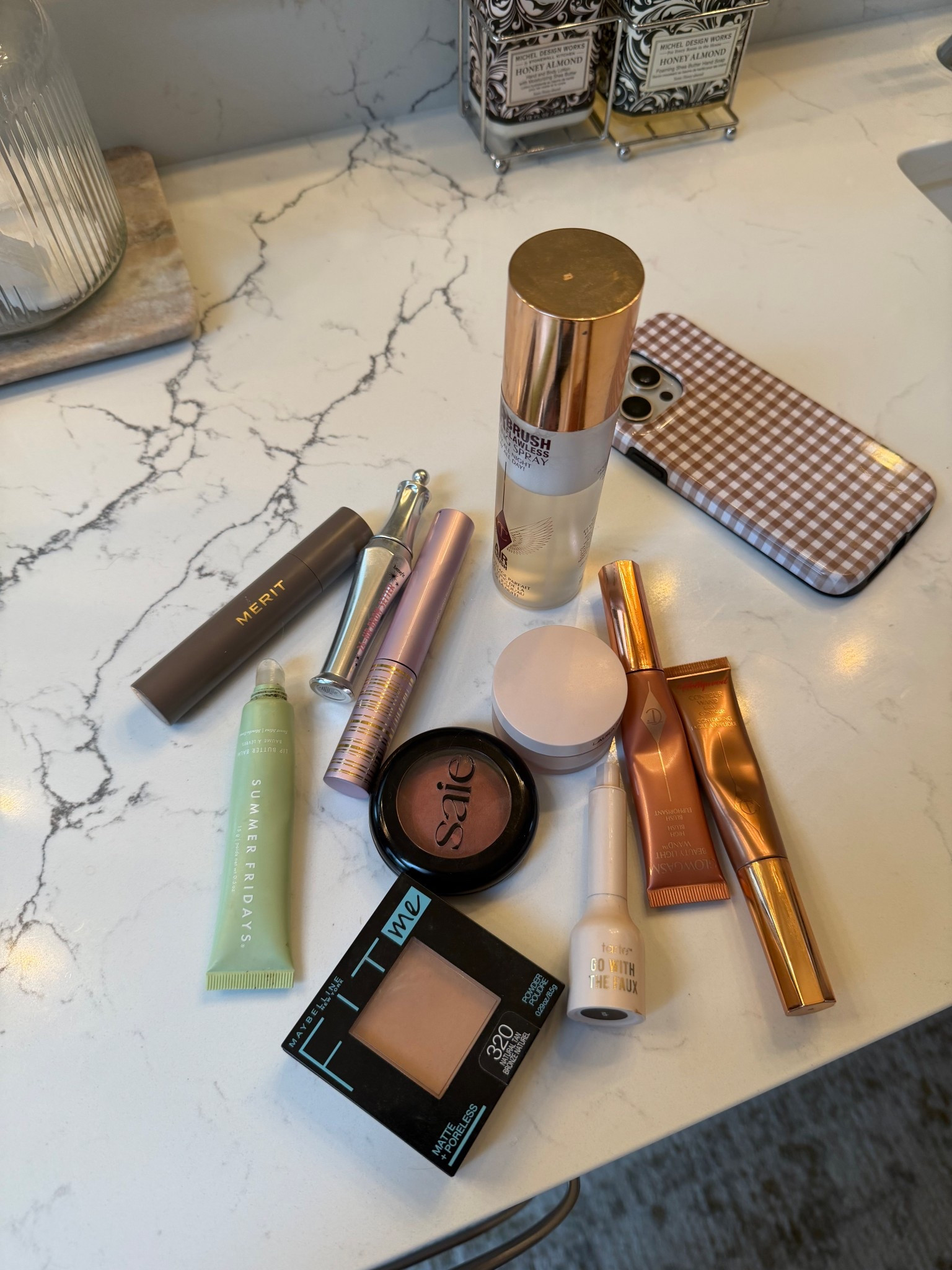 My updated everyday 5 minute make up routine! 🌟 All products and variants are listed in the caption below! 👇🏻 

- Milk Hydrogrip Primer 

- Merit The Minimalist Perfecting Complexion Stick in Silk

- Tarte Go With the Faux Freckle Stamp

- Charlotte Tilbury Hollywood Contour Wand in Fair

- Charlotte Tilbury Beauty Highlighter Wand Glowgasm in Pinkgasm

- Saie SuperSuede Blush in Ciao

- Maybelline Fit Me Matte + Poreless in 320 Natural Tan

- Laura Mercier Translucent Setting Powder 

- Benefit 24-HR Brow Setter Clear Brow Gel

- Tarte Tubing Mascara 

- Summer Fridays Lip Butter in Sweet Mint

- Charlotte Tilbury Airbrush Setting Spray 


#LTKmomlife #LTKgrwm #LTKBeauty