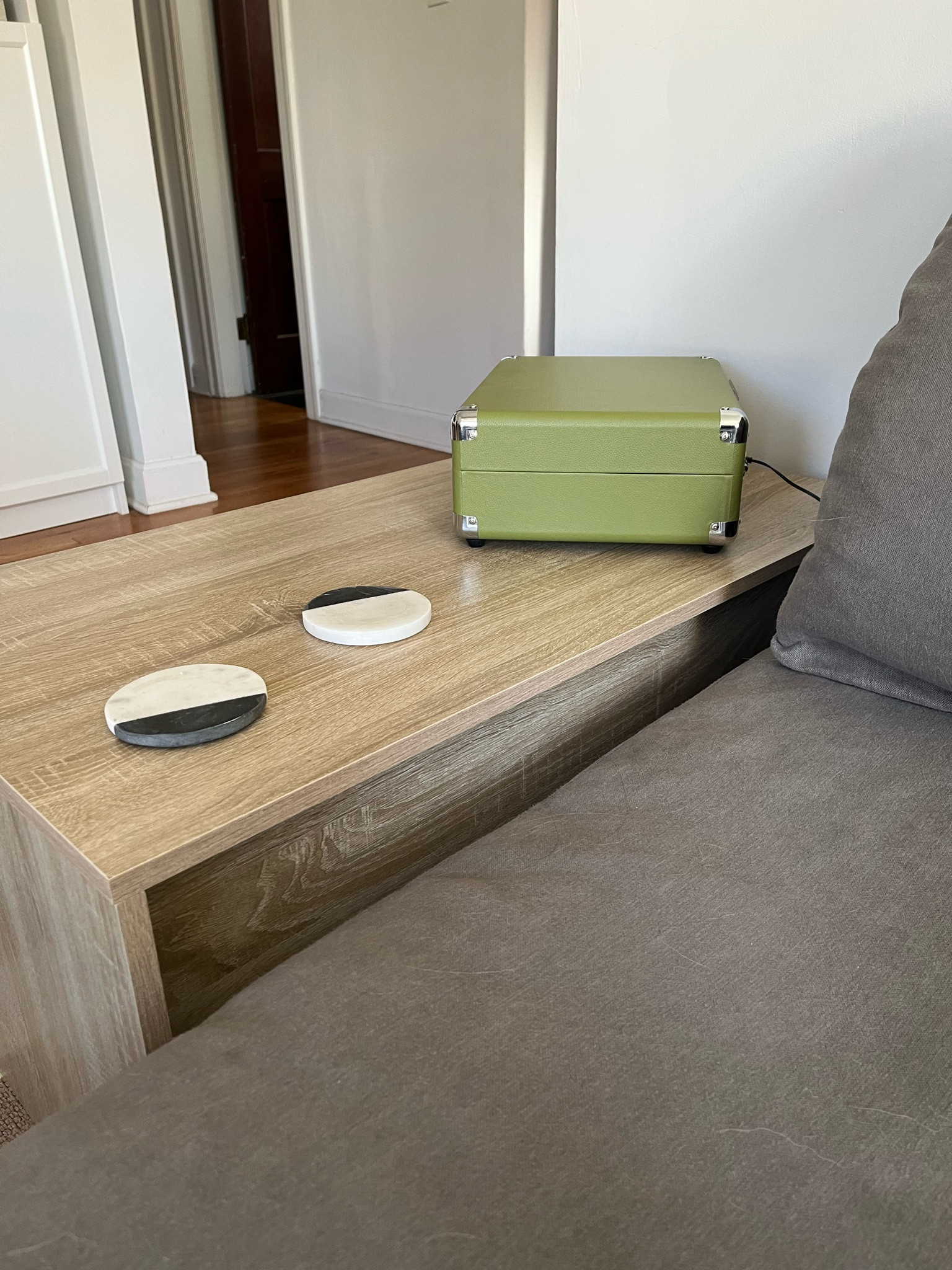 In LOVE with our new end table + with our cutie new record player too 🎶

Pros: 

💚 No filter in only natural light to show true finish! The color is perfection + the wood texture looks so real. It’s a great natural white oak alternative. 

💚 A complete steal at $134! 

💚 True size: 35-7/16”W x 19-13/16”D x 16-5/16”H [trust me.. measuring things is my job] 

💚 An end table with storage was a must in our tiny living room. I love love love these drawers. 

💚 It is technically a coffee table which means all sides are finished + beautiful! 

💚 See more angles of this piece on my feed! 

Cons: 

1️⃣ It took a long time to assemble. 

2️⃣ We knew this going in, but the finish is not super durable. Our first shipment had some damage, so we needed to exchange it for another. But since then, no sign of wear + tear at all! 

All in all, both cons were 100% worth the extremely affordable price. We are so happy with it + it really levels up our space ✨ 

coffee table with drawers, sled coffee table drawers, affordable white oak coffee table, white oak veneer, modern white oak coffee table, modern coffee table storage, rectangular coffee table storage, latitude run Sonoma oak, latitude run coffee table white chipboard, vidaxl coffee table Sonoma oak, vidaxl coffee table drawers, 3’ coffee table, 36” coffee table, small living room coffee table, small living room ideas, minimal coffee table, minimalist coffee table, minimalistic coffee table, minimalism coffee table

#LTKFind #LTKhome