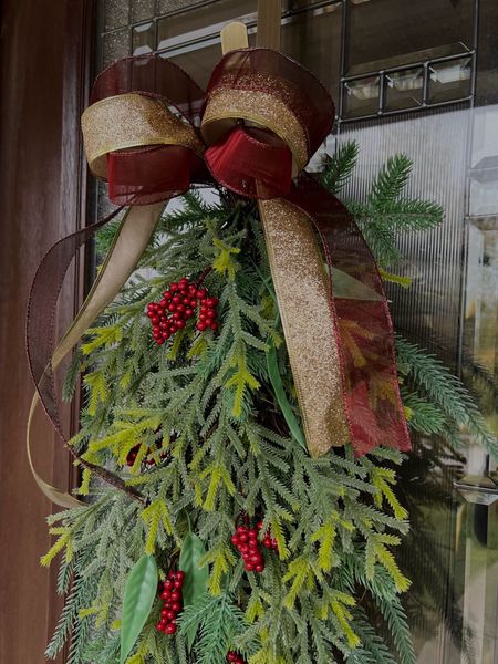Christmas door swag, berry and pine wreath, holiday wreath, Christmas decor, Christmas ribbon 

#LTKhome #LTKHoliday #LTKSeasonal