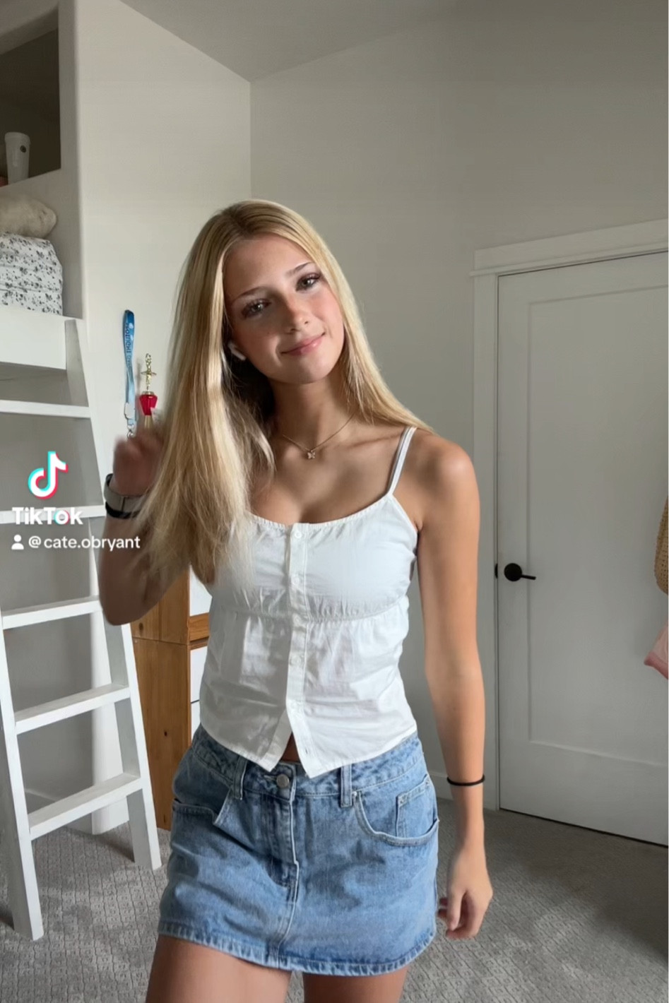 Brandy tank top paired with denim mini skirt for warm weather 

#LTKU #LTKVideo #LTKSeasonal