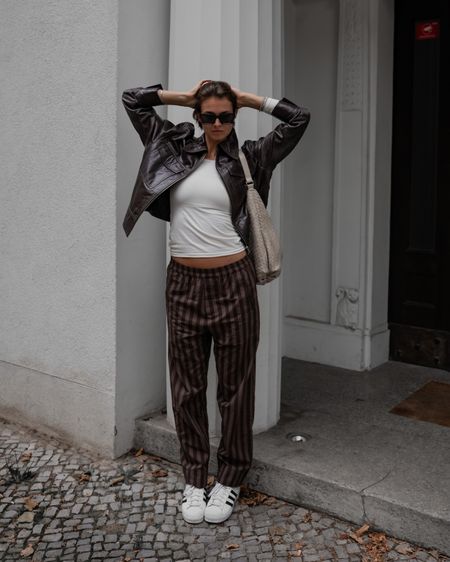 It’s a „wearing my PJs all day“ kinda day 🐒 pyjama pants styled with adidas superstars, a white heattec shirt and cropped jacket 

#LTKstyletip #LTKSeasonal #LTKeurope
