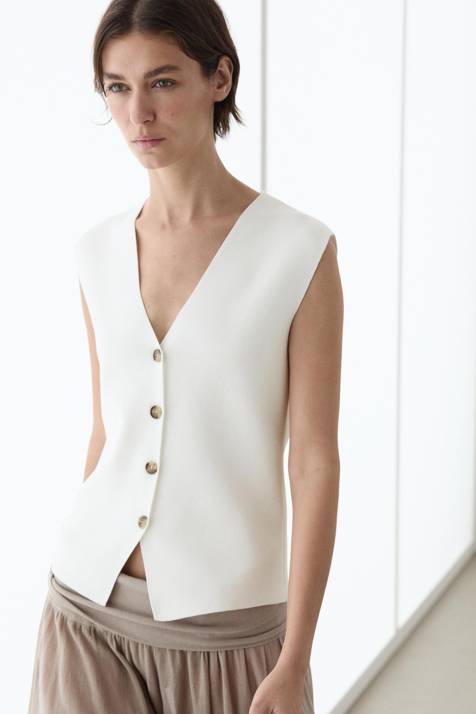 Knit waistcoat with button details \u00b7 White \u00b7 Vest | Massimo Dutti | Massimo Dutti UK