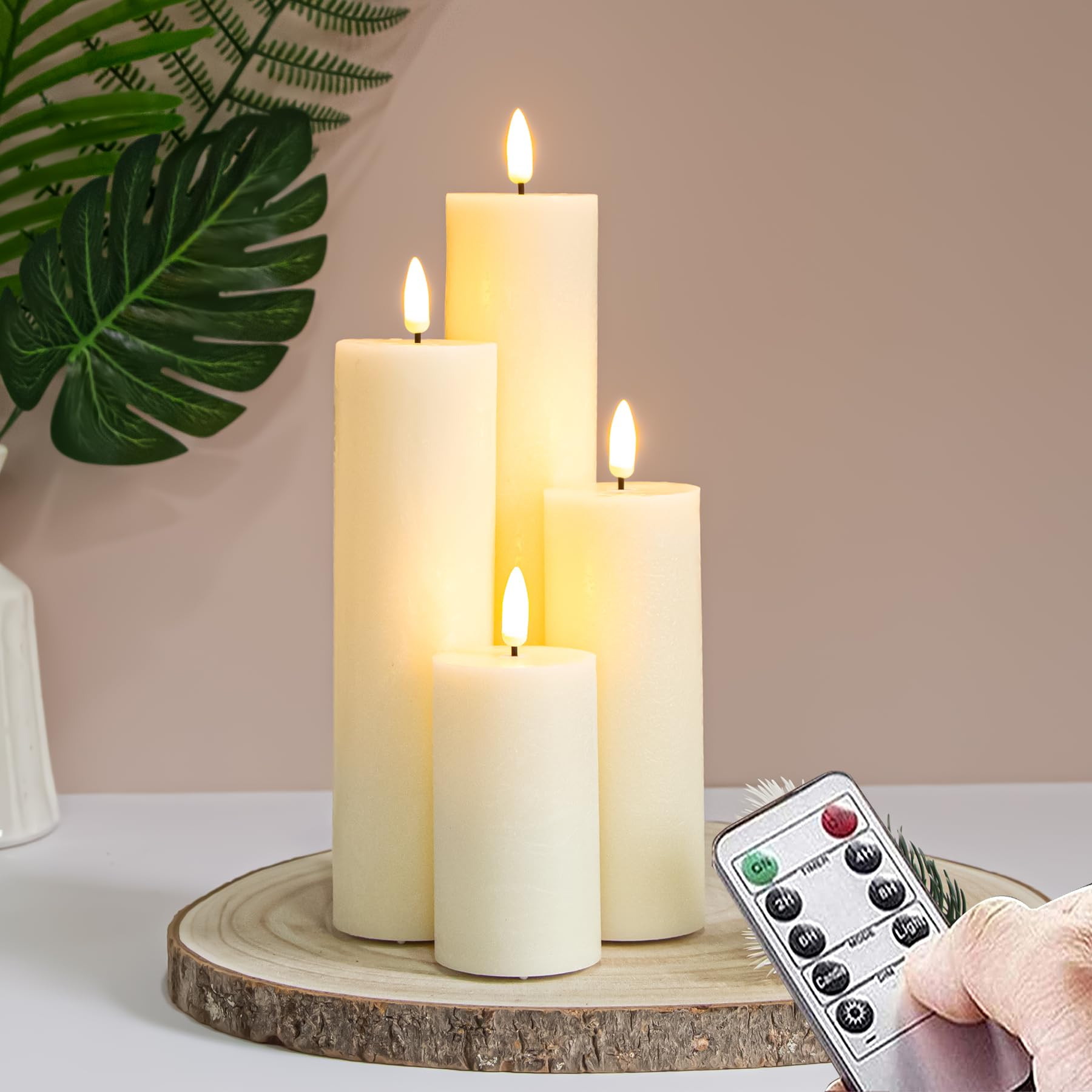 Flickering Flameless Pillar Candles with Remote Control and Cycle Timer,Ivory Pack of 4 Battery O... | Amazon (US)