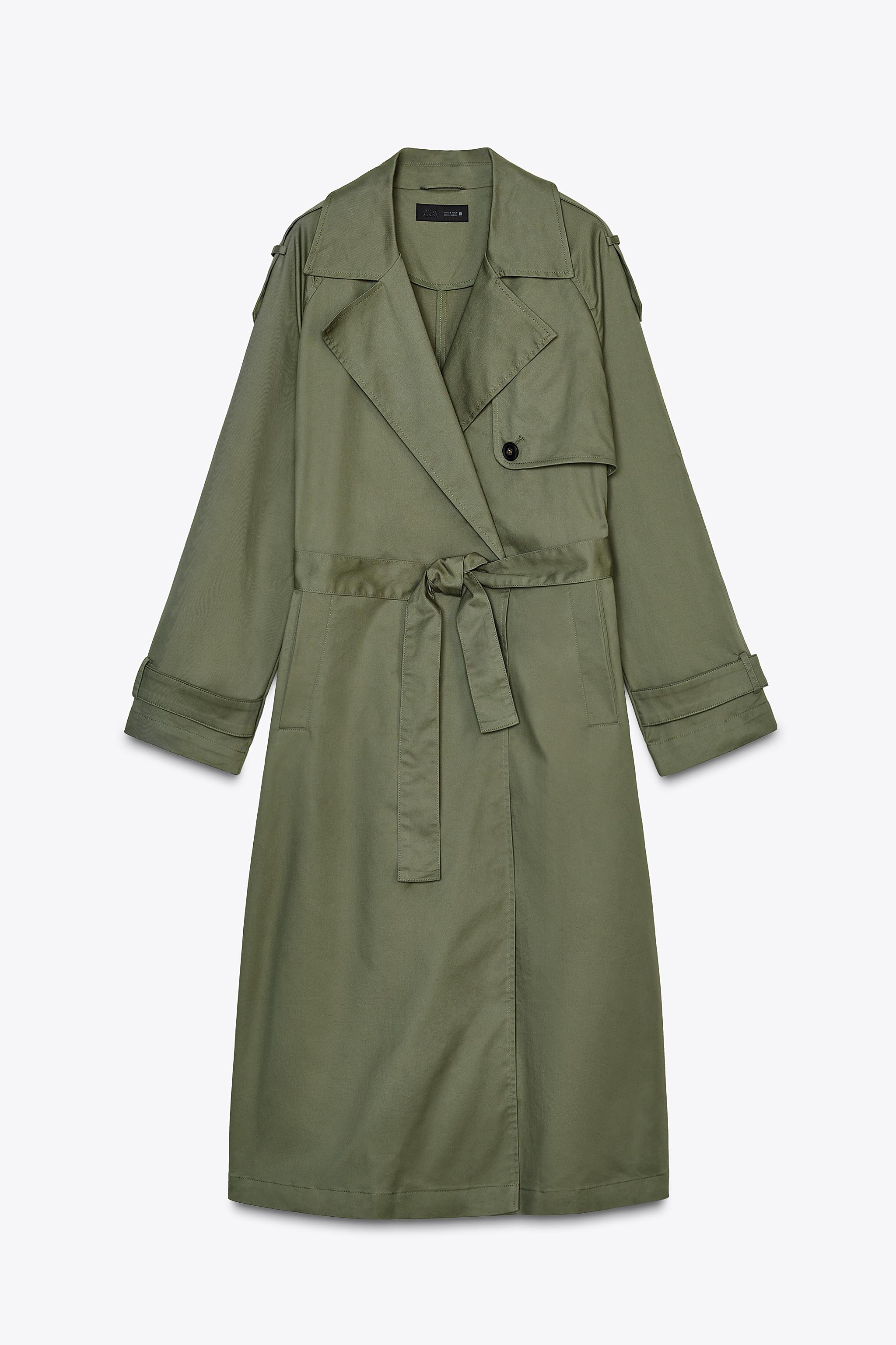 Long trench coat with lapel collar and long sleeves with buttoned tab cuffs. Front welt pockets. ... | Zara US