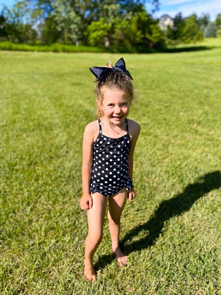 My daughter in her cute black & white polka dot one-piece swimsuit that is on sale using code MAGGIE15! It's great to wear at the beach or for a fun water play in the backyard!
#toddlerclothes #swimwear #kidsfashion #summerstyle

#LTKSeasonal #LTKKids #LTKSaleAlert