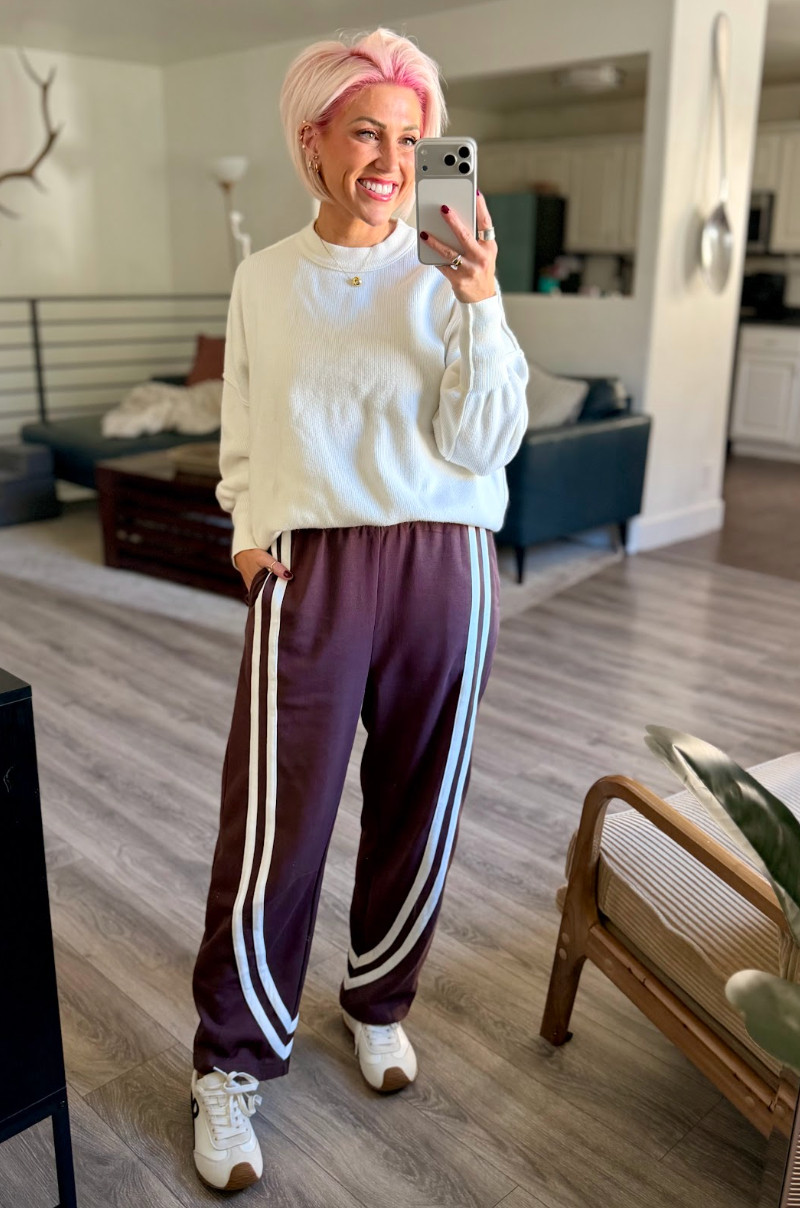 Loving the unique stripes on these track pants and this whole outfit gets a 10 out of 10 for comfort!! Sweater: Small // Pants: Medium // Shoes: TTS 

 #LTKootd #LTKSaleAlert