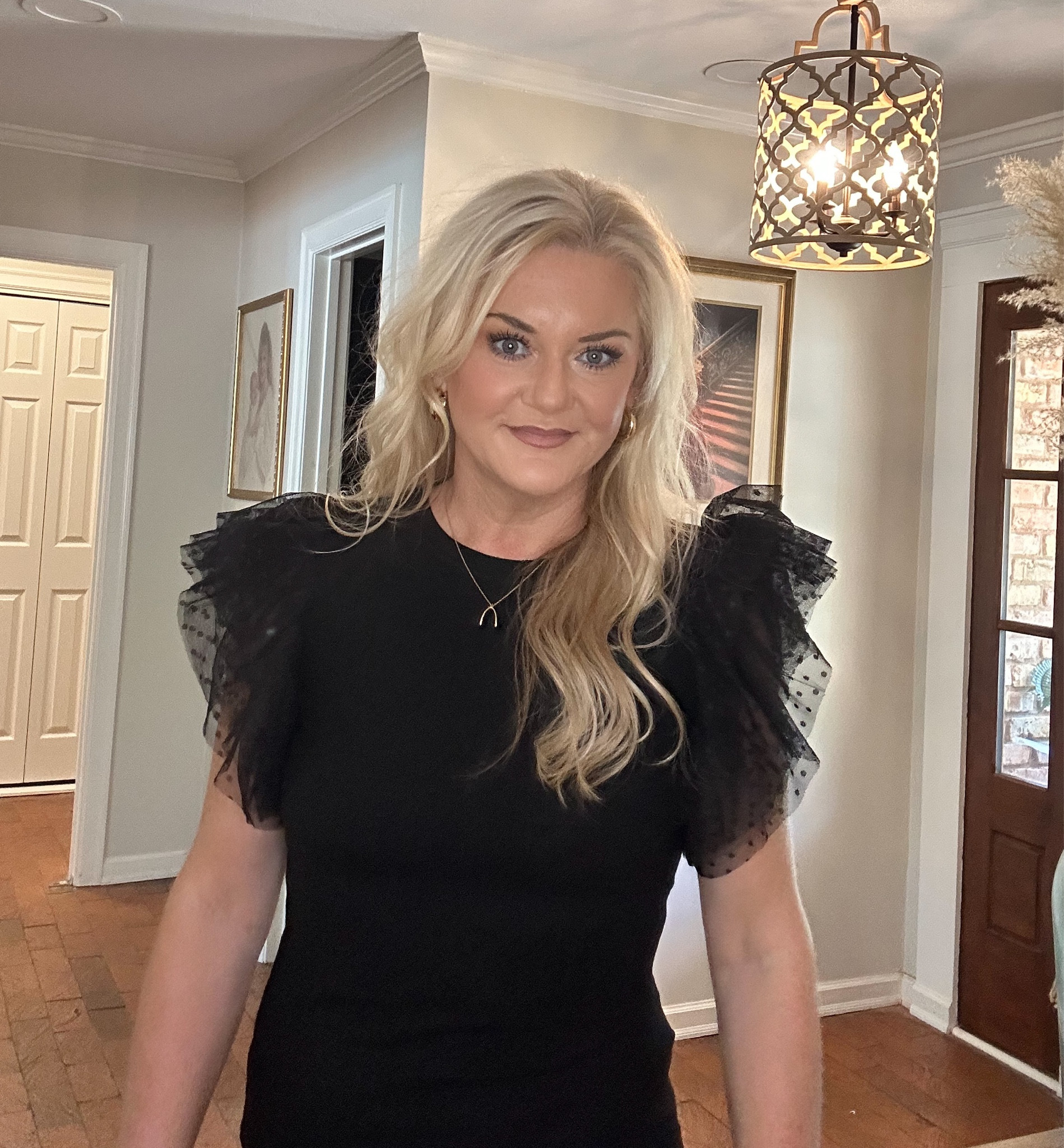 The absolute cutest top with ruffle sleeves! Dress it up with black pants or wear with jeans! 

#LTKstyletip #LTKfindsunder50