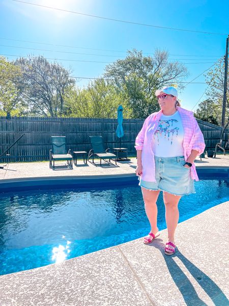 🎵 It feels like Summer 🎵 

The sunshine is my best friend! Sharing this casual jean shorts outfit with a graphic tee, lightweight button up, hat, and sandals. 

#LTKcurves #LTKshoecrush #LTKSeasonal