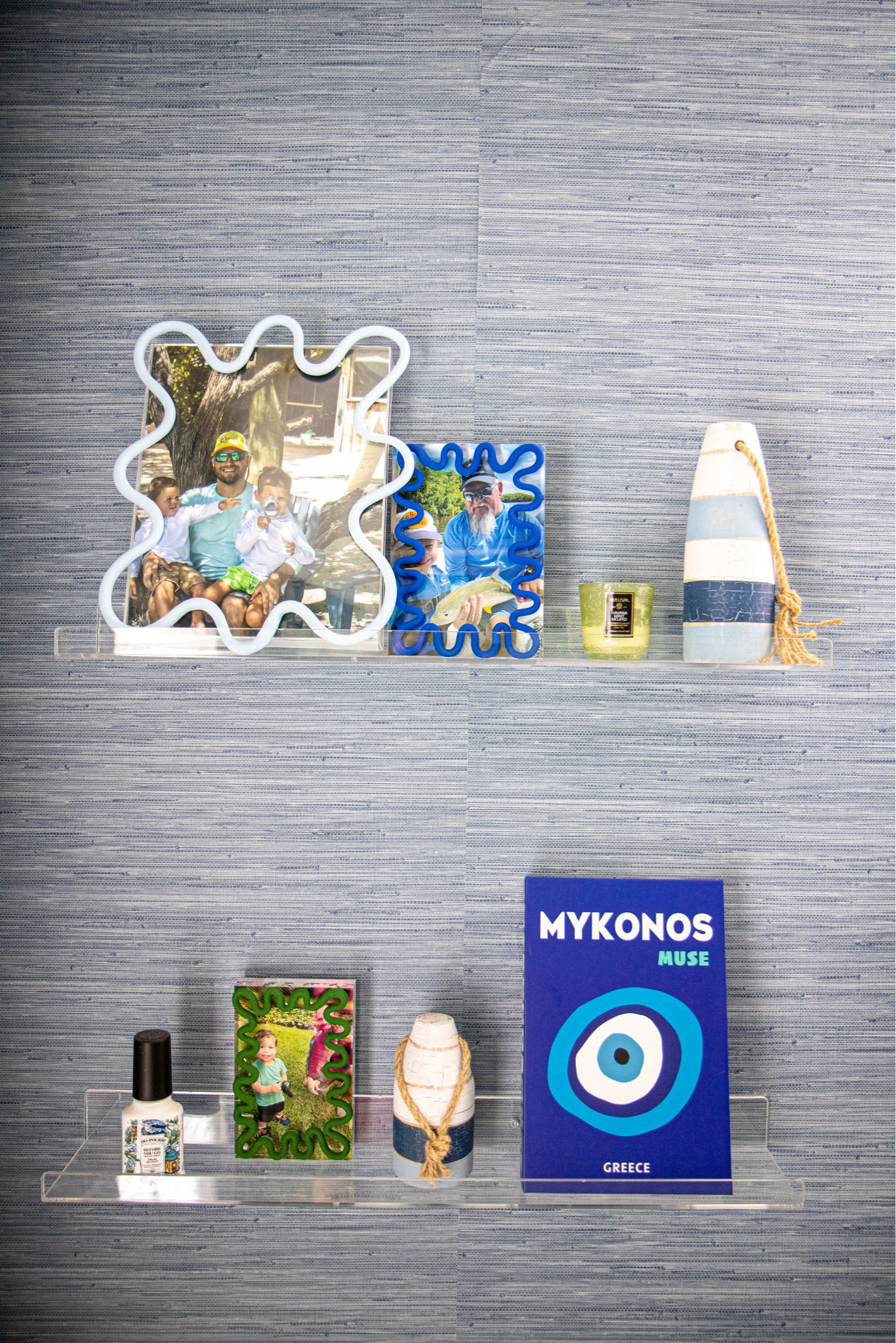 The boys bathroom update is finally complete. 💚💙 A weekend project that turned into MONTHS of hunting for the perfect shower curtain.. I did not think that would be the hardest part of this project! 🫠 Lucky for you I sourced this custom shower curtain from @pepperhome & it arrived DAYS after I ordered it! The rest of the project just took me a weekend - paint on the cabinet, peel & stick @socialsociety wallpaper, a new light & mirror! 

Boys bathroom, nautical bathroom, blue and white, green and blue home decor, grass cloth wallpaper, scalloped mirror, scalloped picture frame, #pepperhome #SLpartner #serenaandlily #socialsociety 

#LTKhome #LTKkids #LTKfamily