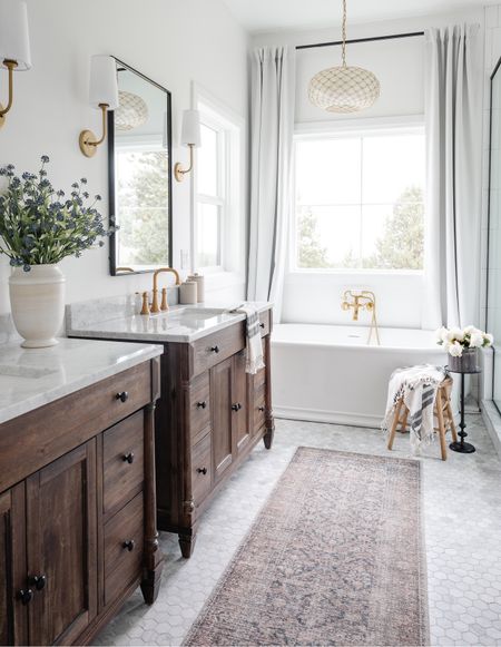 Shop the post! Linked what I could in our primary bath!  Head to IG for a little tour! 

Bathroom, Serena and lily, marble, tile, faucet, plumbing, bathtub, curtains, wall sconce, bathroom decor, runner, rug, Loloi, amber interiors, pedestal table, accent table, floral, faux stems 

#LTKhome #LTKFind