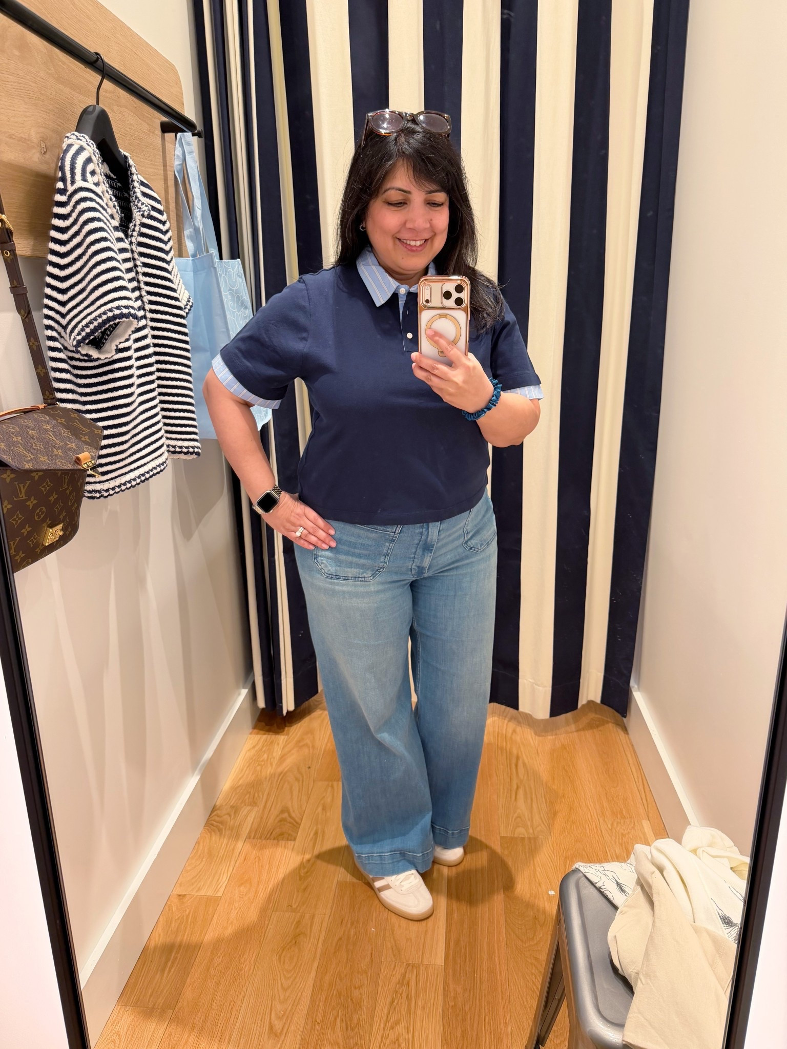 Casual spring outfit! This layered cotton polo shirt is so cute. Love the crisp poplin collar and cuffs mixed with this cotton jersey material. Such a cute combo that pairs well with jeans or shorts. 

J. Crew top size large (but would prefer an XL). Anthropologie Colette jeans size 32 Petite. Adidas handball Spezial sneakers. These run big so size down. I normally wear a 7.5 or 8 in shoes and I wear these in a size 7. 

#LTKOver40 #LTKMidsize #LTKPetite