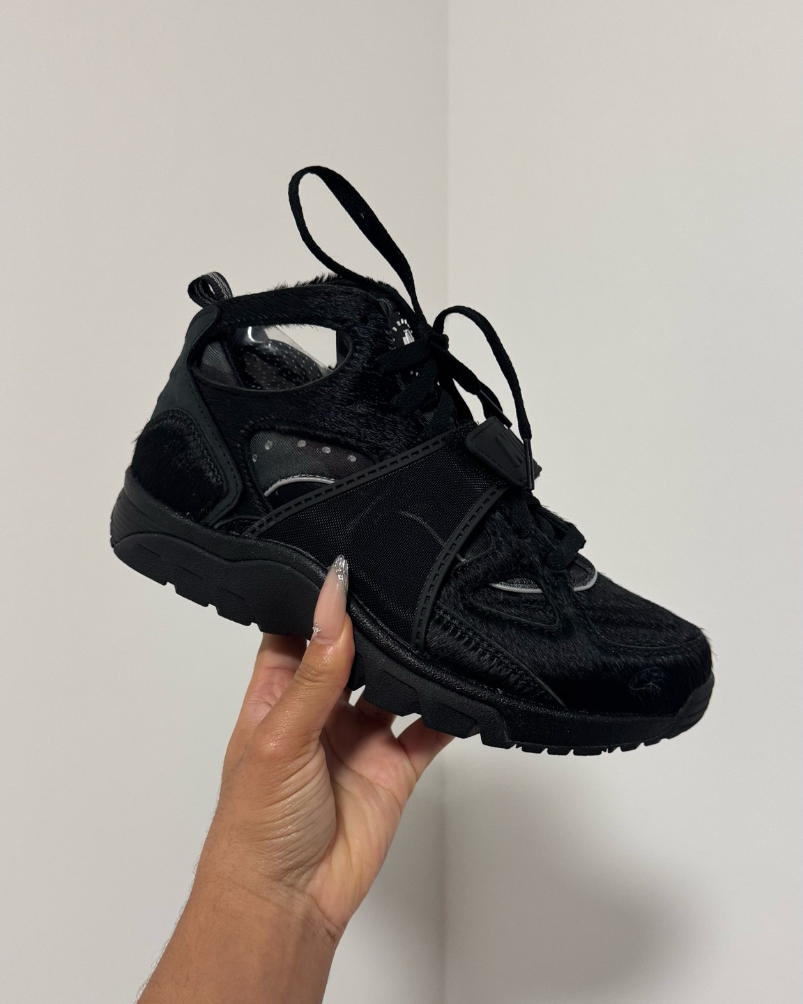 I love what the Corteiz brand did with the Nike Air Trainer Huarache. Blacking it out and adding pony hair was a sure way to get the people talking !

#LTKShoeCrush #LTKStyleTip