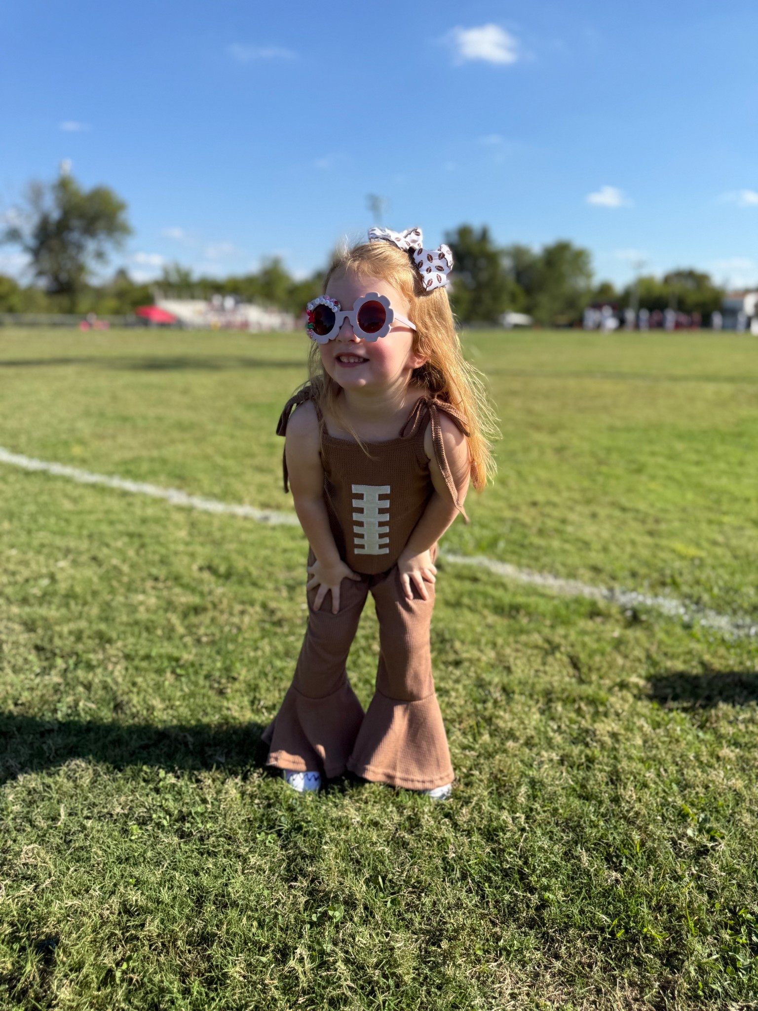 The cutest football sister there ever was 🏈🎀