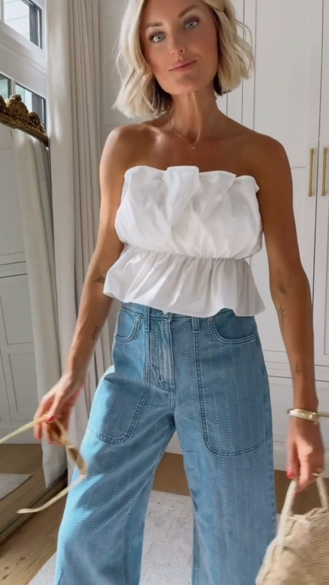How fun is this bubble peplum top? Looks like it’s designer but it’s from Amazon! I paired it with these barrel jeans from Target that I’ve been loving as well! Wearing S top and 4 jeans

Loverly grey, Target barrel jeans, white ruffle statement strapless top, how to style white bubble top, high rise barrel jeans, women’s affordable summer fashion, shell rattan bag

#LTKSeasonal