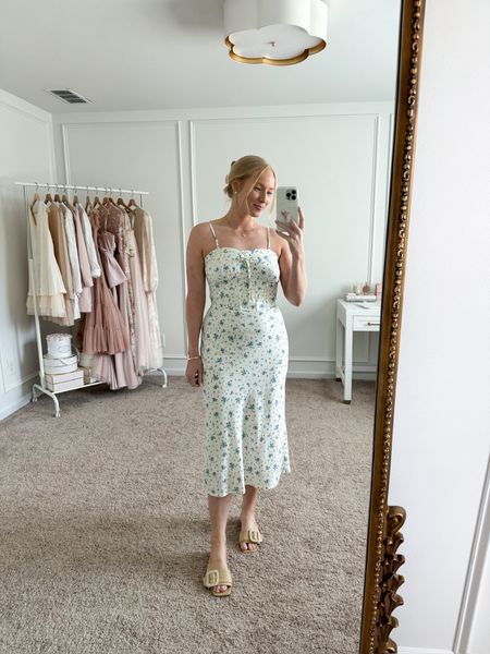 How pretty is this floral midi dress from Target?! Would be perfect for an upscale brunch or garden party! Wearing size small. Summer dresses // shower dresses // party dresses // event dresses // date night dresses // brunch dresses // Target dresses // Target finds 

#LTKStyleTip #LTKFindsUnder50 #LTKSeasonal