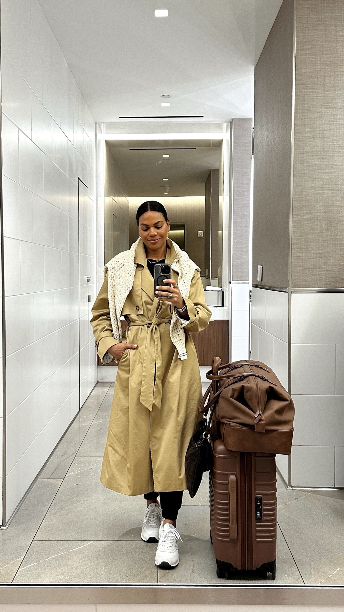 What I wore to the airport! Sneakers, sweats, and a trench to feel fancy. I always throw a sweater over the shoulders incase it’s cold on the plane! 

#LTKOver40 #LTKStyleTip