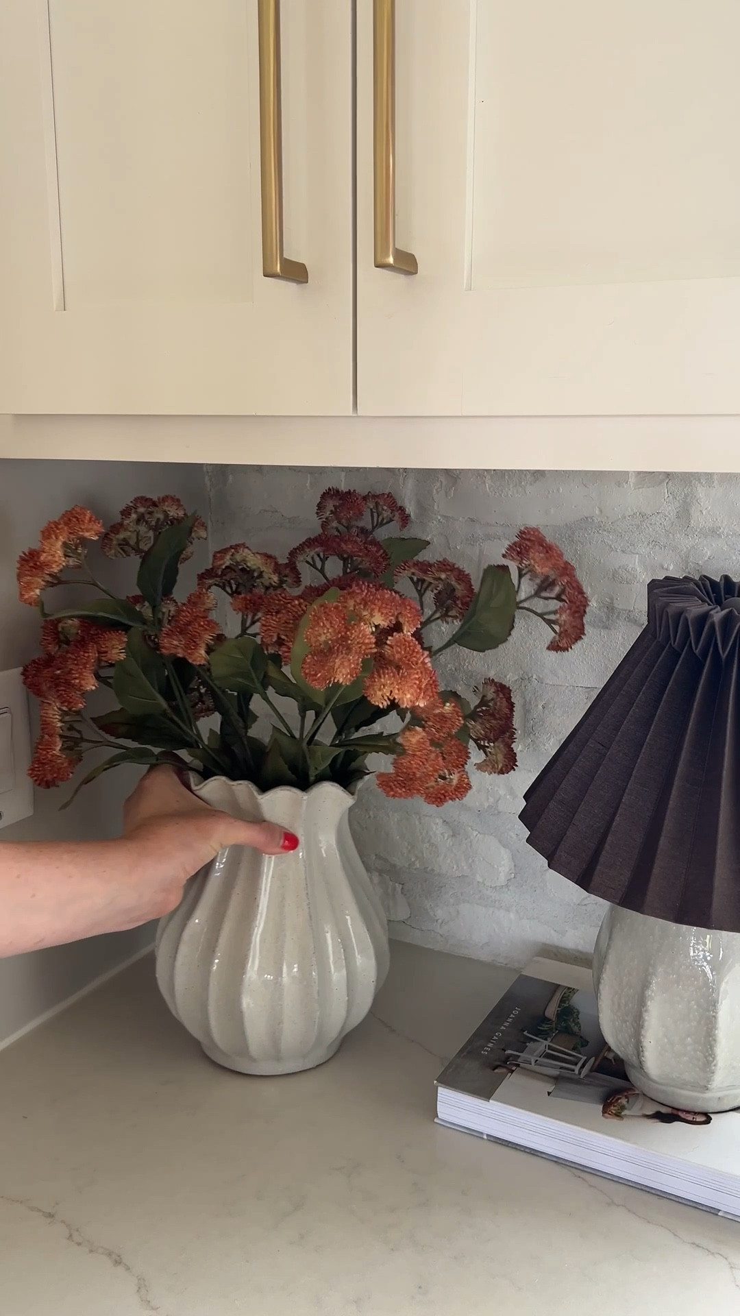 This vase is the 9” pleated vase and I have 5 stems in here! (Folded them at the ends a bit so not too tall) 

#LTKStyleTip #LTKHome #LTKFindsUnder50