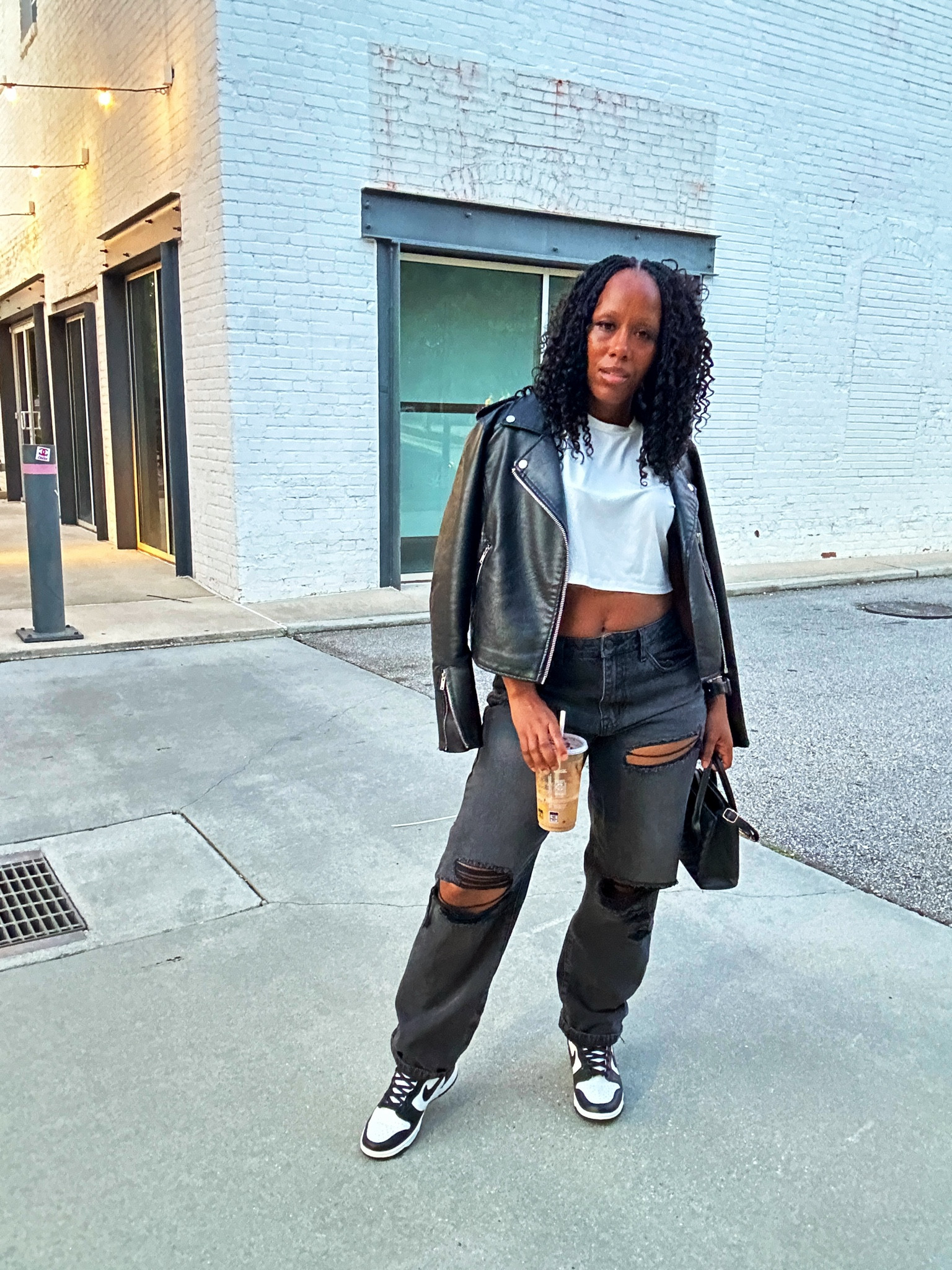 Fall outfit idea!

I’m wearing a black faux leather jacket, white crop top t shirt, and black distressed jeans.

I styled this casual outfit with a black mini crossbody bag and Nike Dunk High Panda sneakers

#LTKStyleTip #LTKFindsUnder50 #LTKSeasonal