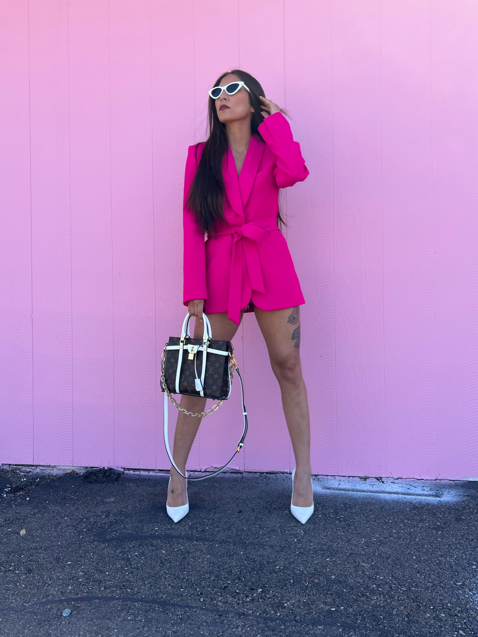 Viva Magenta! Pink blazers never disappoint. This wrap blazer is so luxurious. I’m wearing a small for an oversized look. 

Paired with retro inspired sunglasses, #schutz pumps, and my Louis Vuitton toiletry bag  

#LTKstyletip #LTKshoecrush