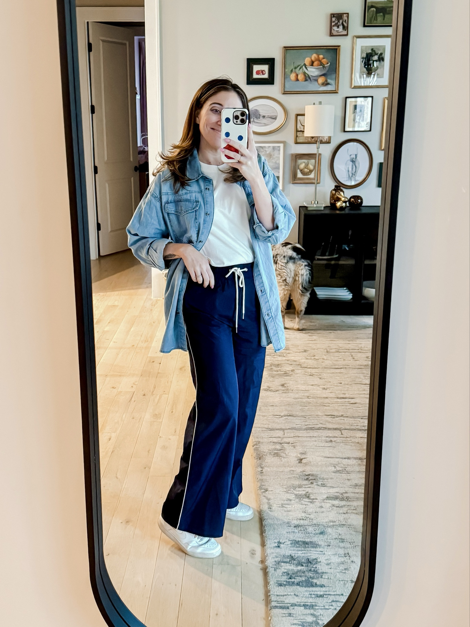 Comfy layered mom ootd! This spring weather is so up and down so layering is key. And a denim or chambray button down is my most used layering piece 
Top M / White tee M / Track pants M / Sneakers tts 

#LTKMidsize #LTKmomlife #LTKootd