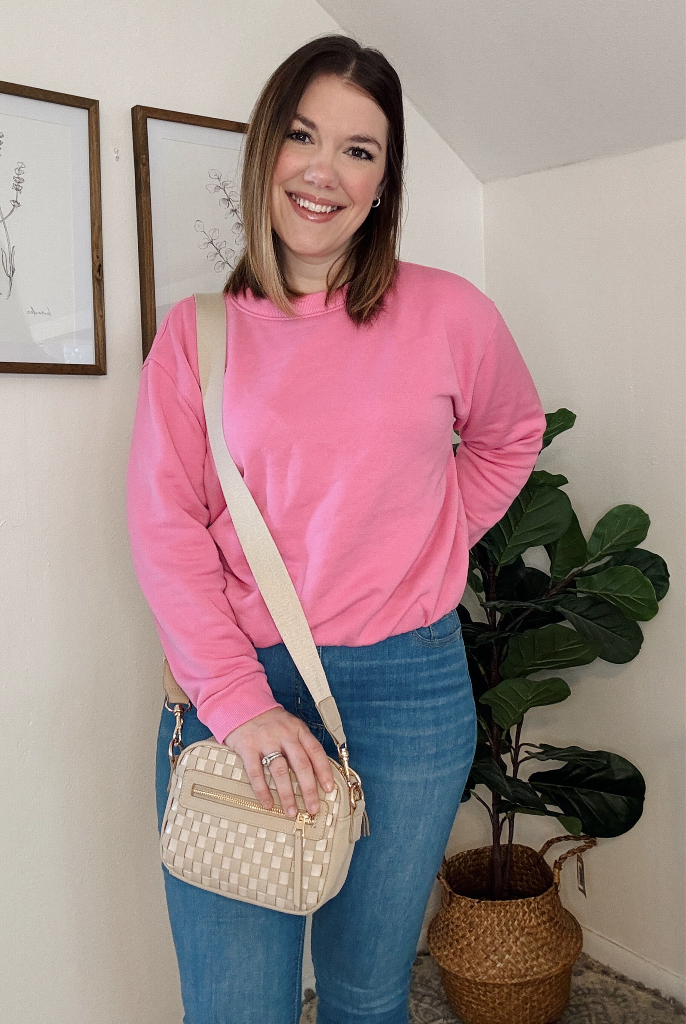 This outfit makes me feel really good about myself, even with my C-section pooch! I'm wearing high-waisted jeans and a bubble sweater from Target. I added a really cute purse to the look. Wearing pink makes me feel so pretty! 💕🌸

#LTKmidsize #LTKbeauty #LTKstyletip
