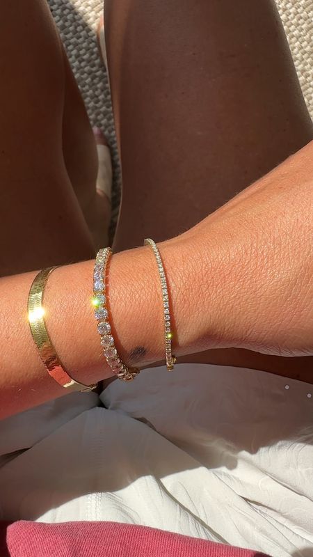 Shop my jewelry! 
Tennis bracelets, herringbone snake bracelets and stacked rings! 

#LTKstyletip