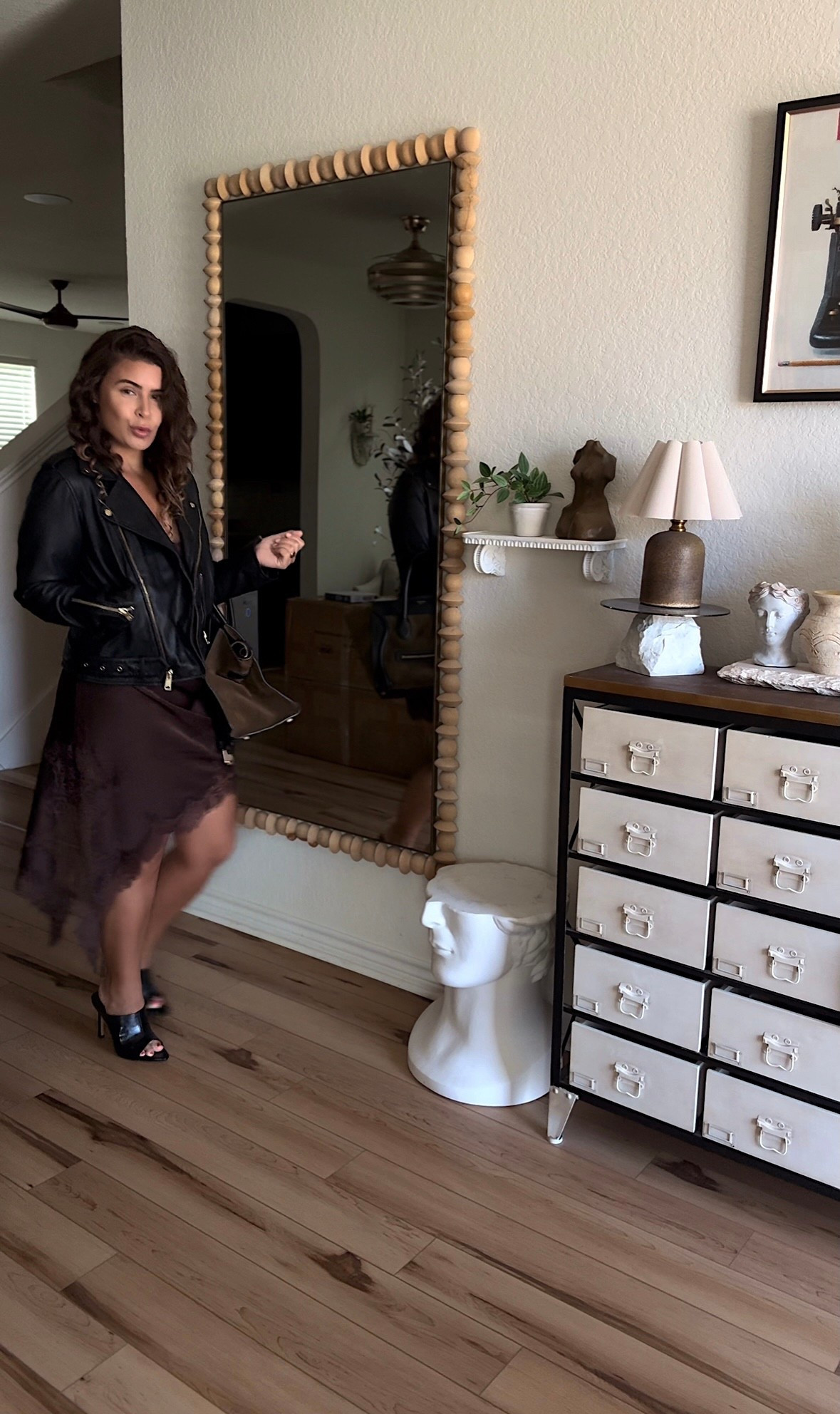 option one. Zara brown lace asymmetrical dress styling. Black leather heeled mule. Allsaints black cropped leather jacket with gold details. Celine brown black suede luggage bag purse  

#LTKShoeCrush #LTKStyleTip #LTKWorkwear