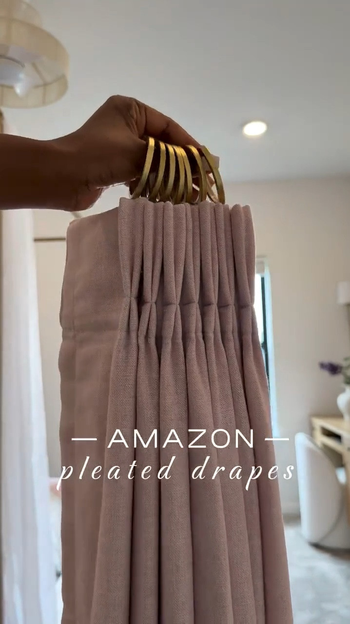 I'm absolutely in love with how  my daughter Michelle's room drapes turned out 👌🏾…..I've also got the same drapes in our guest room and great room.

Like many of you, I received a hefty quote for drapes a few years ago - 10K to be exact…..and that was just for three windows. 😅 I mean, who doesn't love the look of custom drapes? I particularly love the pinch pleat - it's my favorite. 😍 

One thing to keep in mind with this system is that you'll need to account for roughly 6 inches of slack. 🤎 So if your ceiling height is 108 inches, you'll need to order 102-inch drapes if you want to hang the rod at the very top and have the drapes ""kiss"" the floor. Thanks to hubby for helping me figure out precision & measurements. Shop now and  transform your home.

#LTKSaleAlert #LTKStyleTip #LTKHome