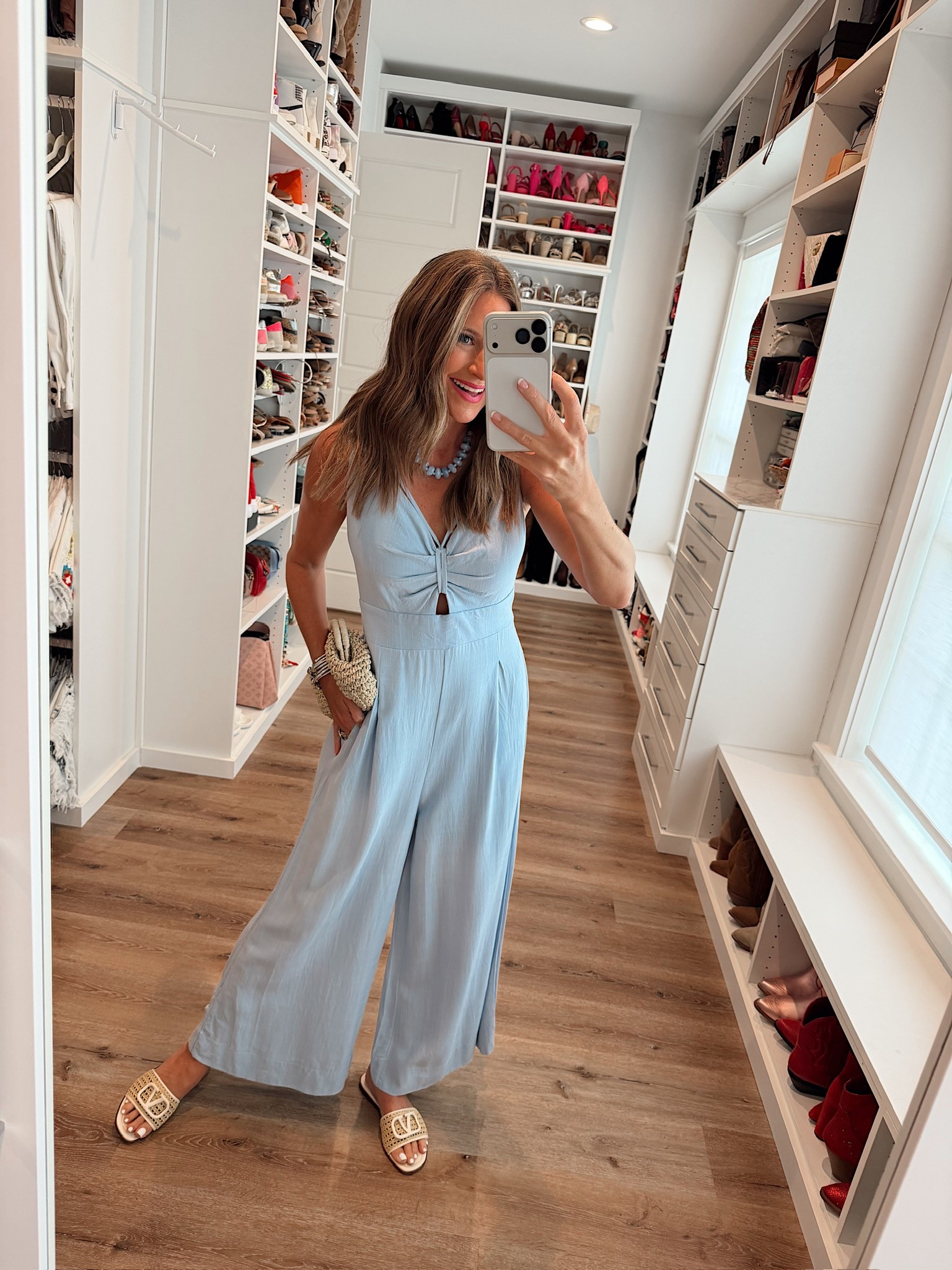 In a small jumpsuit, clutch, necklace, sandals and accessories - fits tts.

#LTKootd #LTKgrwm #LTKSeasonal