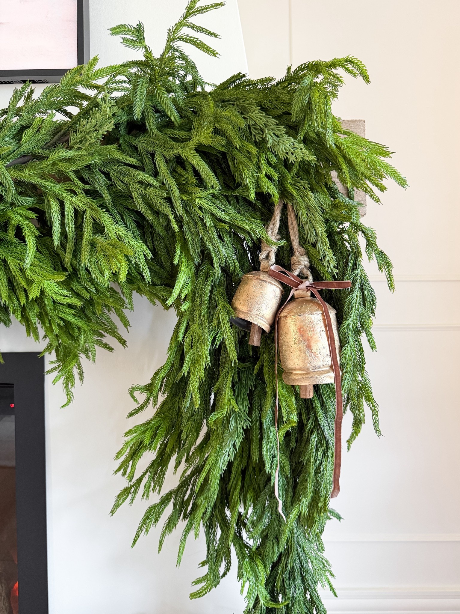 thick garland, chunky vintage bells, topped with the cutest pre tired bow! 

#LTKholiday #LTKsale #LTKhome