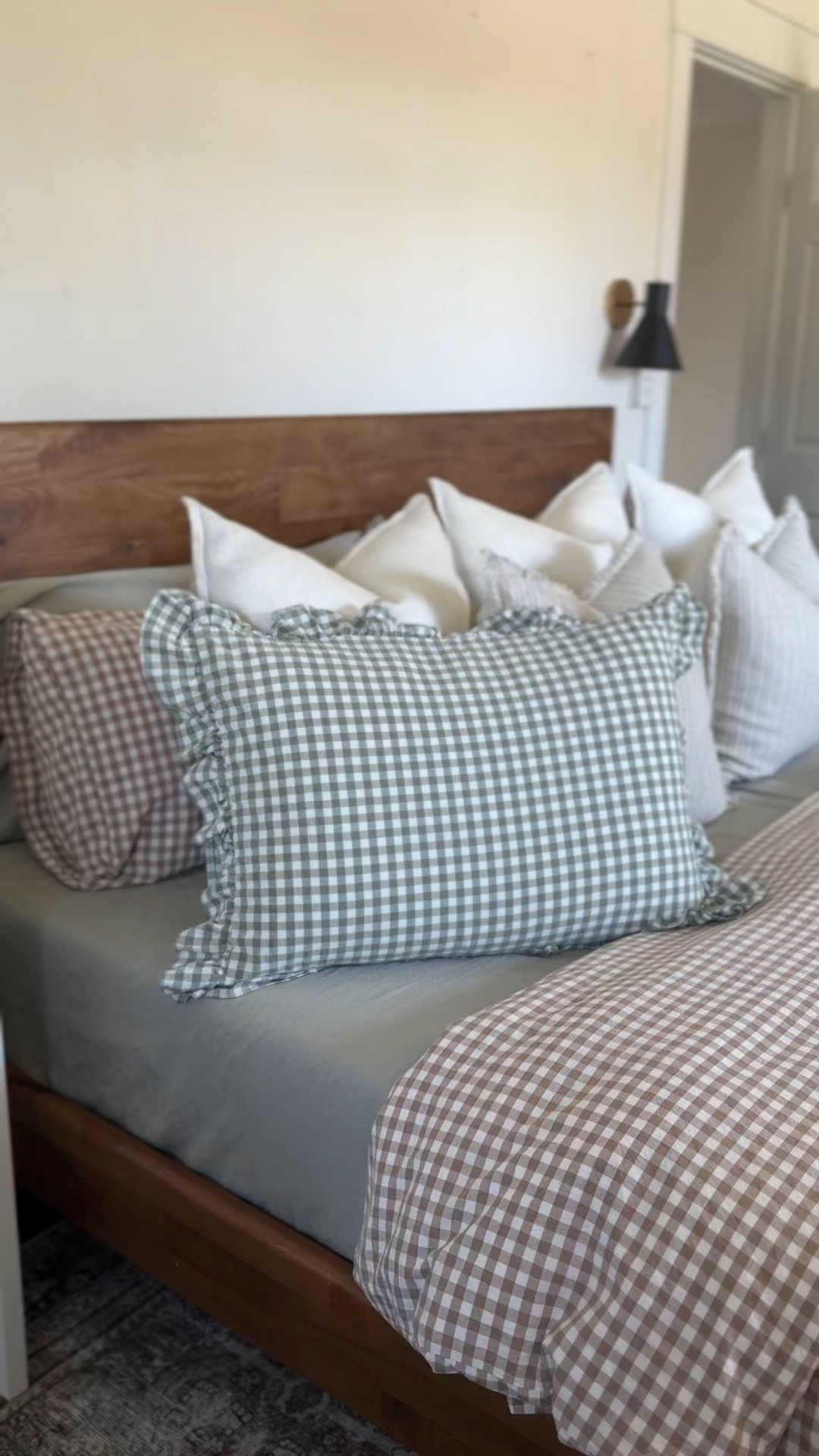 Gingham ruffled pillow case for our standard pillows! This is what I sleep on and keep on a bench when our beds made 🤭🤣 but looove the green gingham!!! So cute for spring 

Amazon finds, Amazon bedding, pillowcase, ruffles, green gingham 

#LTKSeasonal #LTKHome #LTKFindsUnder50