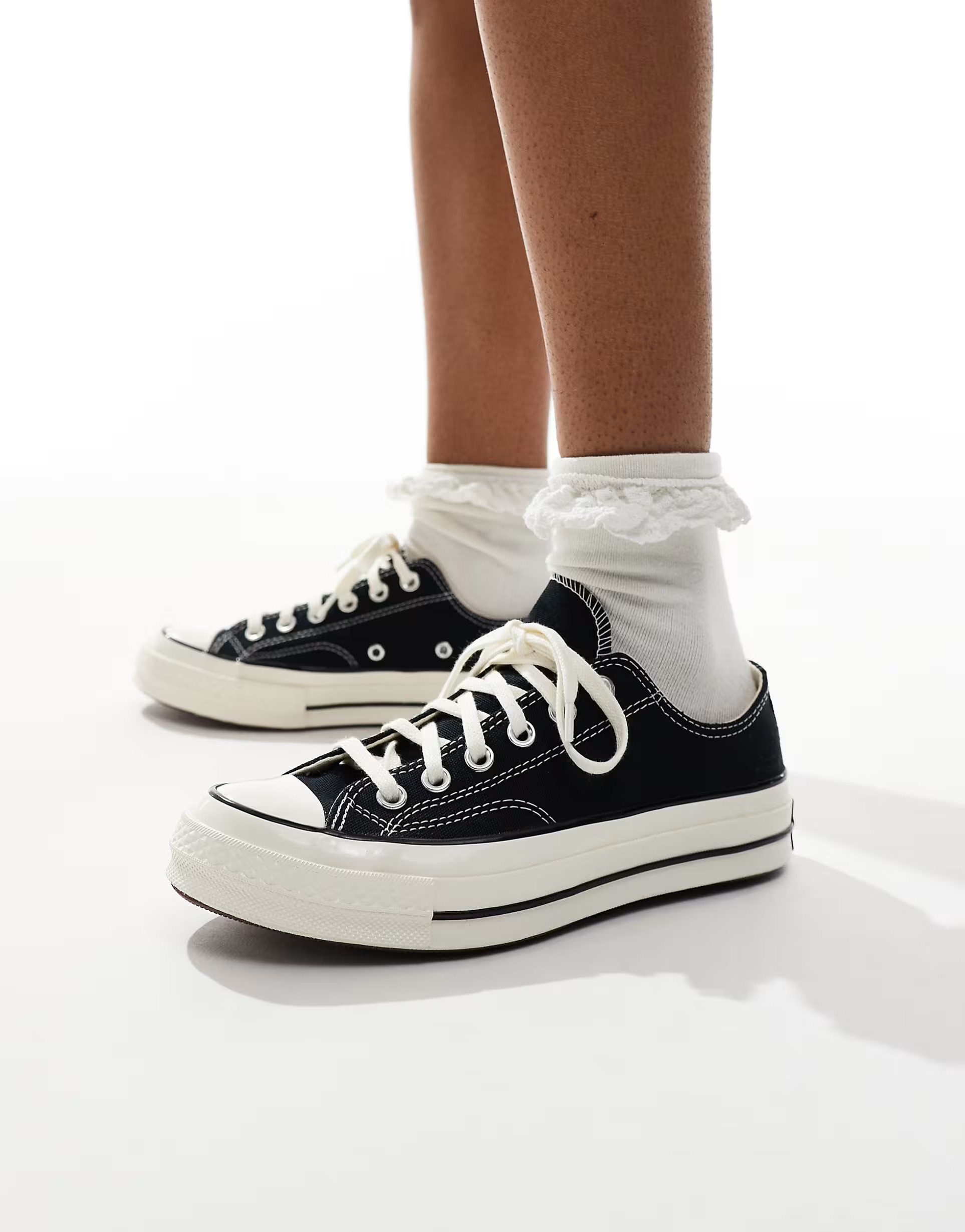Converse Chuck 70 Ox  Wide Fit trainers in black | ASOS (Global)