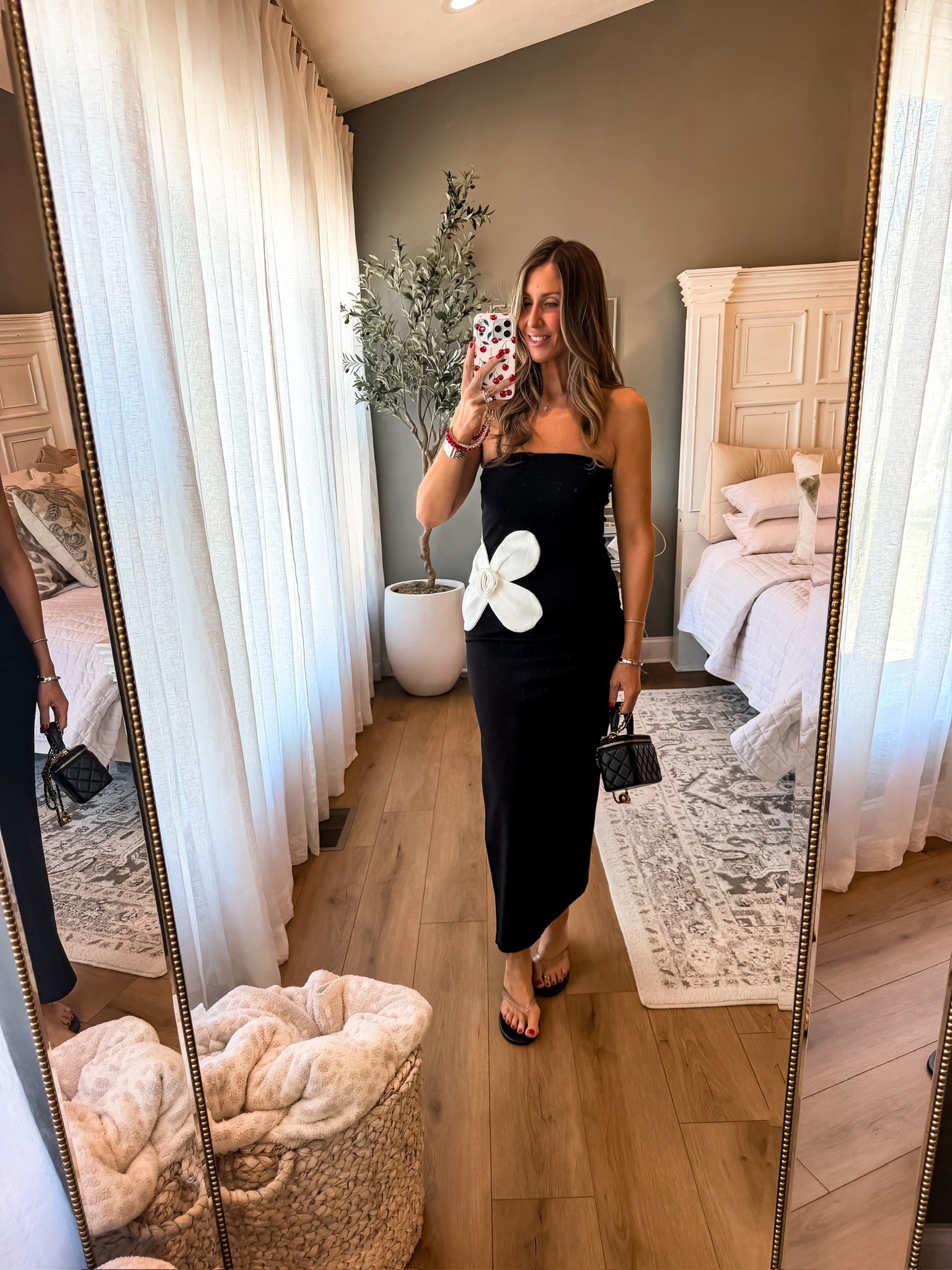 This black strapless maxi dress is such a chic statement, simple, flattering, and elevated with the bold white flower detail. I love it styled with a black bag and flip flops for that effortless look that still feels put together. It’s the perfect outfit for dinners, vacations, or any summer event where you want something easy but standout.

black strapless dress, maxi dress outfit, summer outfit idea, vacation dinner outfit, chic evening look, minimal style, statement dress, flip flop outfit, effortless style, resort wear, themominstyle

#LTKmomlife #LTKSeasonal #LTKOver40