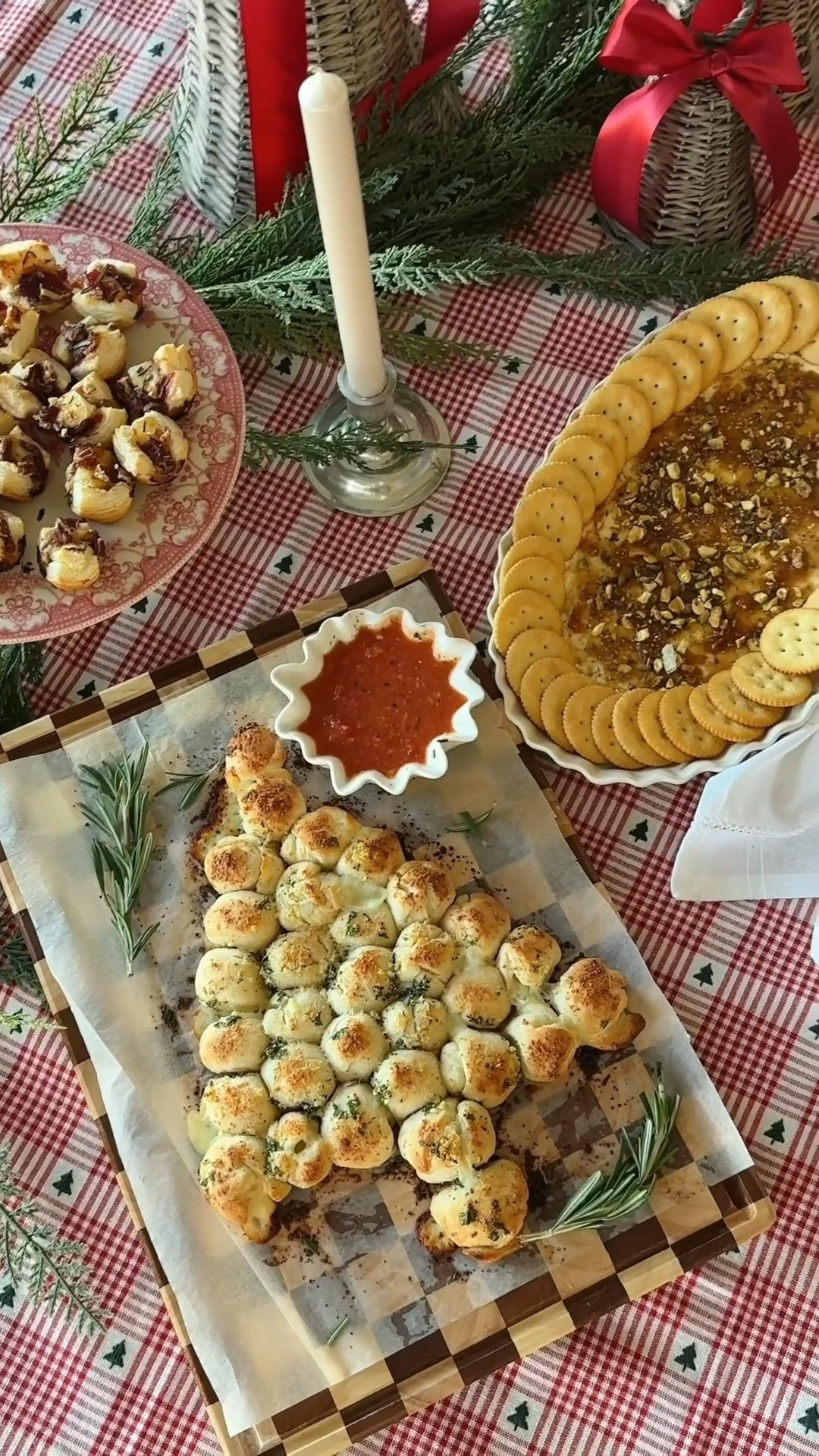 Holiday appetizer: Mozzerella balls 

Ingredients:
- string cheese
- pizza dough
- garlic
- parsley
- butter
- Italian seasoning
- pasta sauce for dipping
- parm cheese

Directions:
1. Cut your string cheese into 1in pieces (I used 5 string cheese sticks) 
2. Roll out your pizza dough and cut them into squares 
3. Place the cut up cheese stick into the pizza dough and form in a ball shape, repeat. 
4. Form them into a Christmas tree shape on parchment paper/baking tray
5. Bake at 400 for 15min 
6. Pull out of oven and brush on your garlic butter mixture (butter, garlic, Parmesan cheese, parsley, & Italian seasoning). 
7. Serve and enjoy! 

#holidayfood #easyrecipe #christmas #holidayrecipe #appetizer 