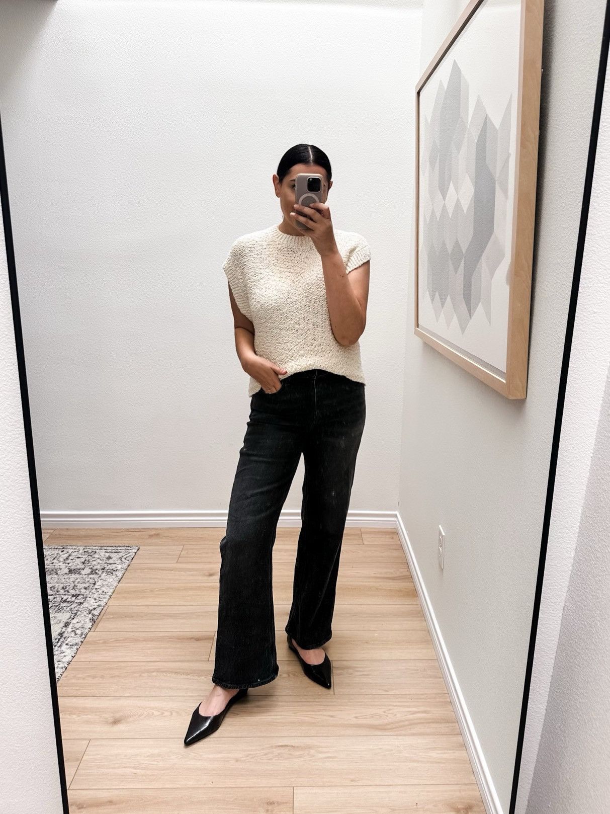 I'm in the medium of the vest, it is stretchy and runs TTS. 

I'm in the 30 of the jeans. They are a looser fit.  

 