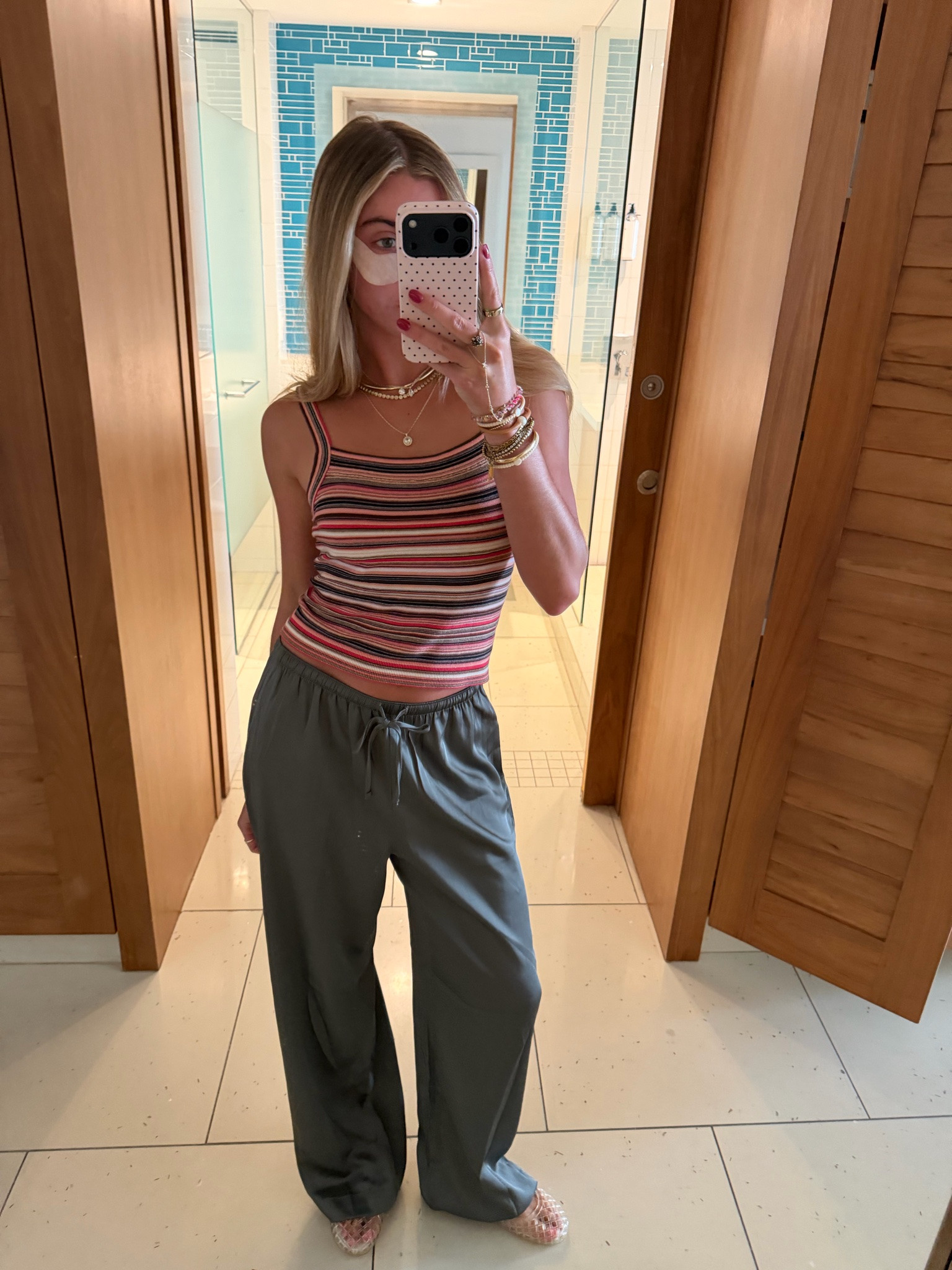 My airport outfit to travel home! My pants size xs @abercrombie the satin wide leg pants. My tank is @Pistola Denim the Frankie knit tank it’s a missoni look for less. My necklaces are all @electricpicks and my favorite jelly shoes from Tory Burch.

#LTKootd #LTKTravel #LTKdayinmylife