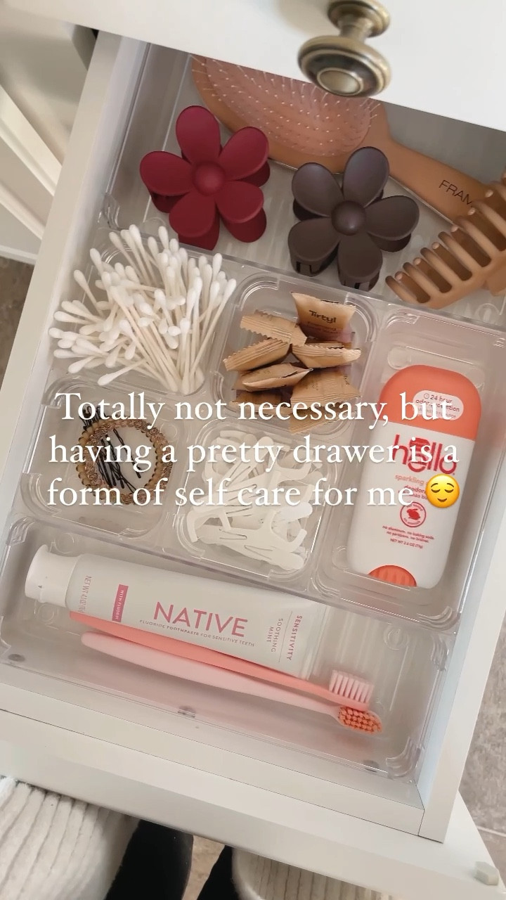 Organized bathroom drawer, bathroom drawer organizers, pink toothbrush, pink hair brush, foaming hand soap tablets, flower claw clip

#LTKunder100 #LTKhome #LTKFind