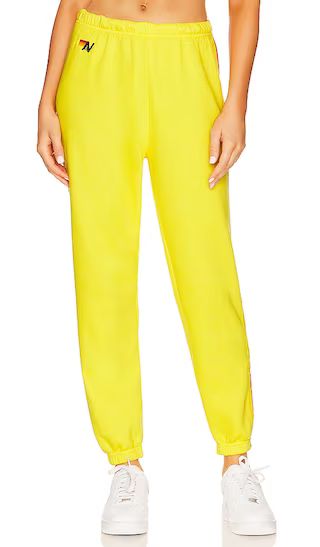 5 Stripe Sweatpant in Lemon, Yellow, & Purple | Revolve Clothing (Global)