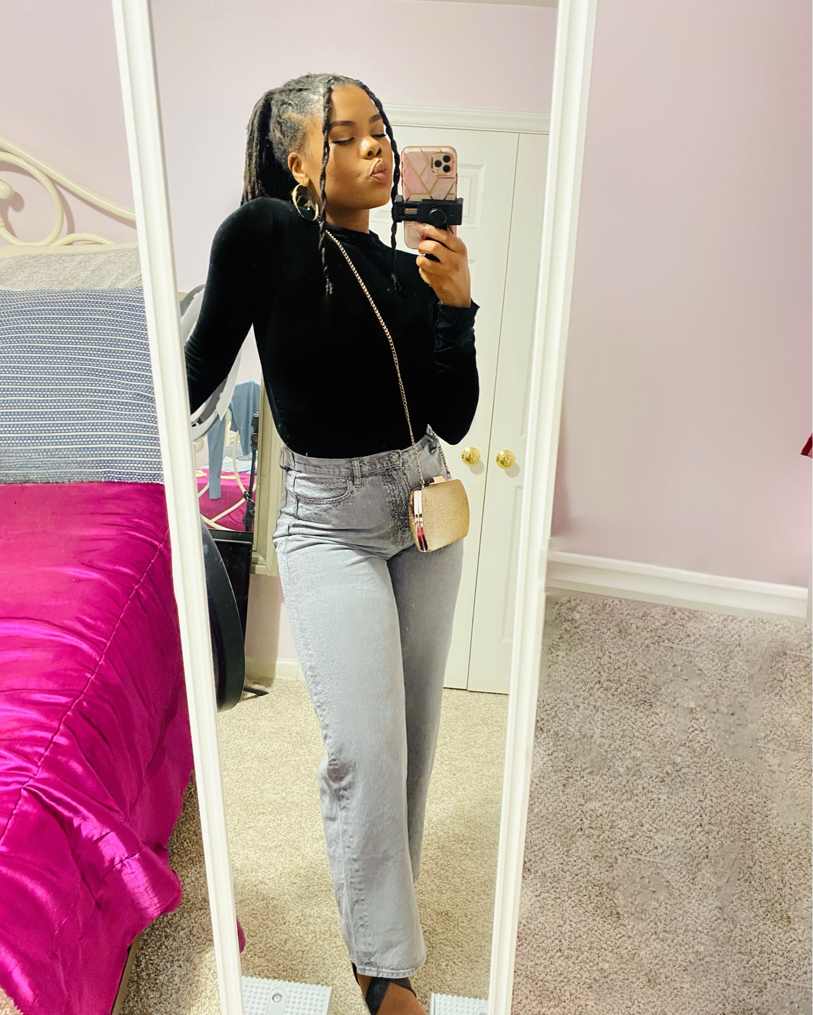 Black long sleeve mock neck top with wide leg high waisted jeans.
Date Night Outfit

#LTKootd