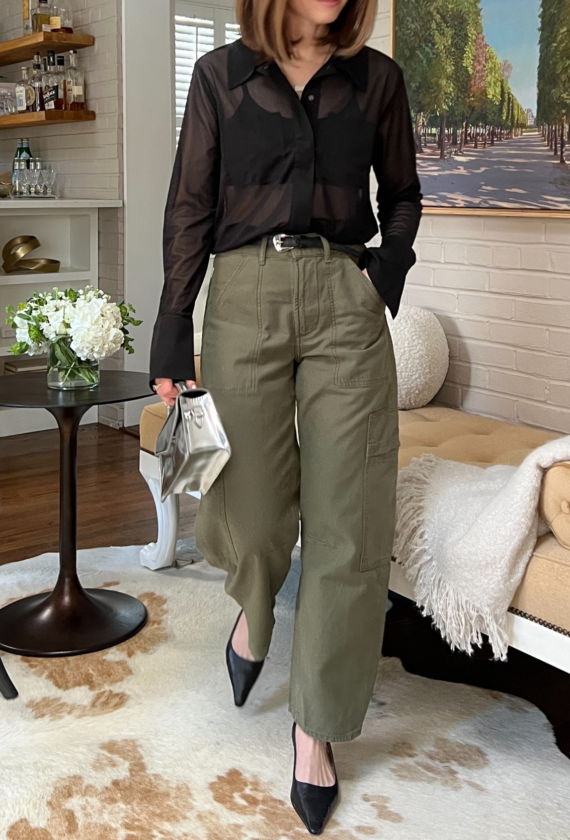 Olive green cargo pants citizens of humanity EVEREVE
Sheer black shirt pistola
Black sling back heels Sam Edelman
Metallic silver bag jcrew 
Belt Dehanche old 

#LTKshoecrush #LTKstyletip