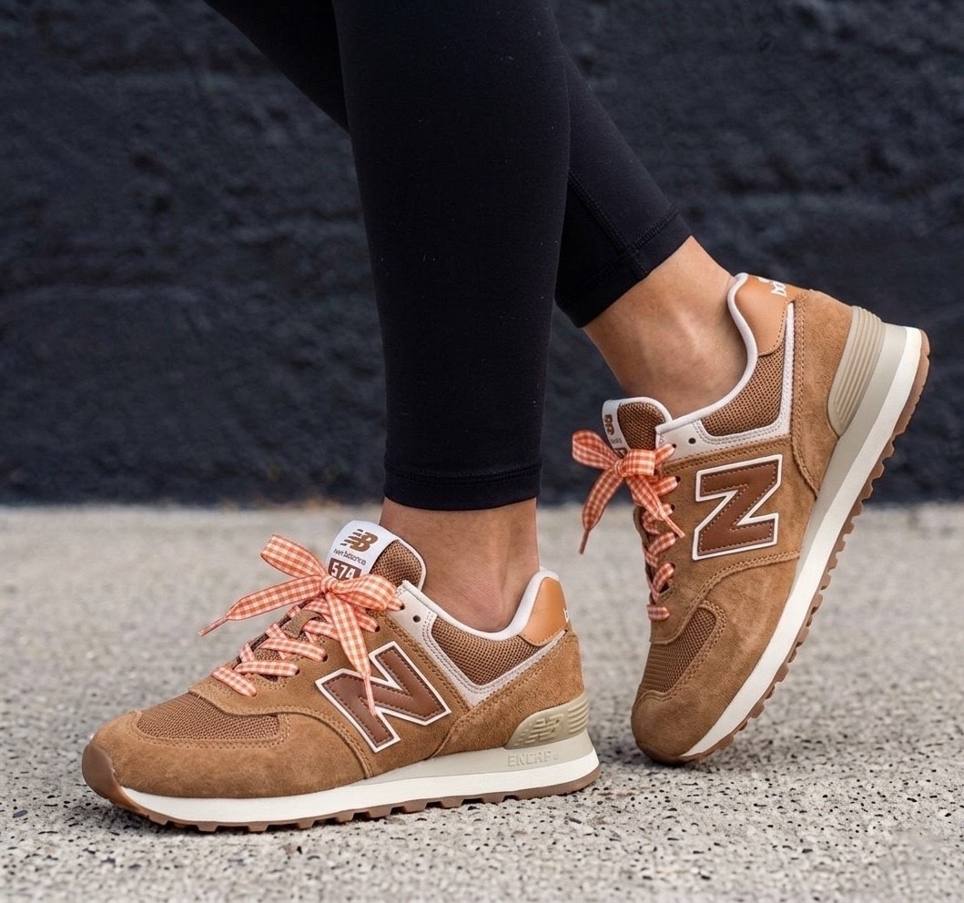 These New Balance 574s are the kind of sneakers that make every outfit look effortlessly put together 🤎. They run true to size, are incredibly comfortable, and the neutral color goes with everything from leggings to denim. I changed the laces for under $10!