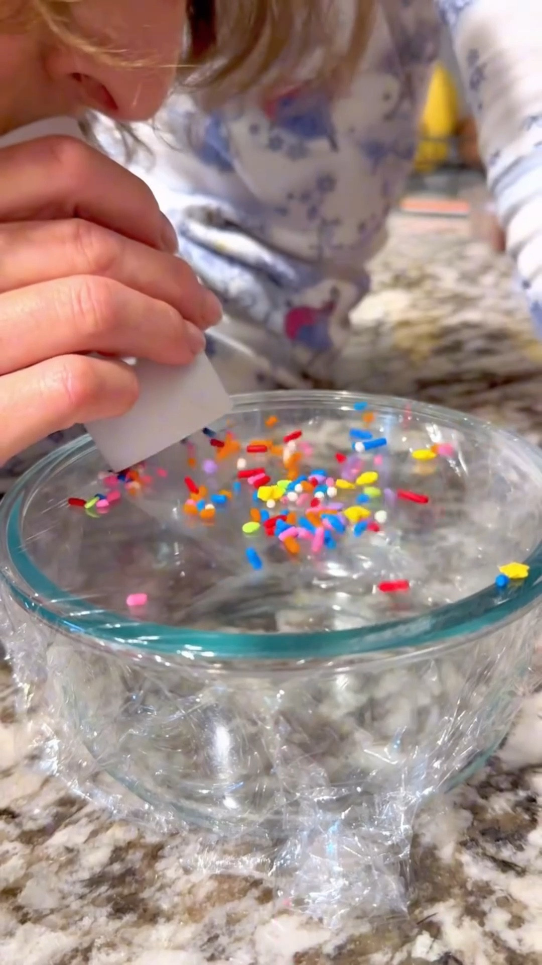 Warning: you will make some truly unhinged noises doing this 😂

We stretched clear plastic wrap tight over a container, sprinkled on some sprinkles, then talked (yelled, hummed, made dinosaur sounds) into a toilet paper roll to send sound vibrations across the surface.

The louder and sillier the noise, the higher the sprinkles bounced. Instant seeing sound magic.

We did this as part of my daughter’s 4th birthday on New Year’s Day — a fun way to sneak in science play while celebrating a brand new year.

Mess-free, quick to set up, and guaranteed laughs.

#scienceplay #preschoolmagic #learningthroughplay #playbasedlearning #newyearactivities

#LTKKids