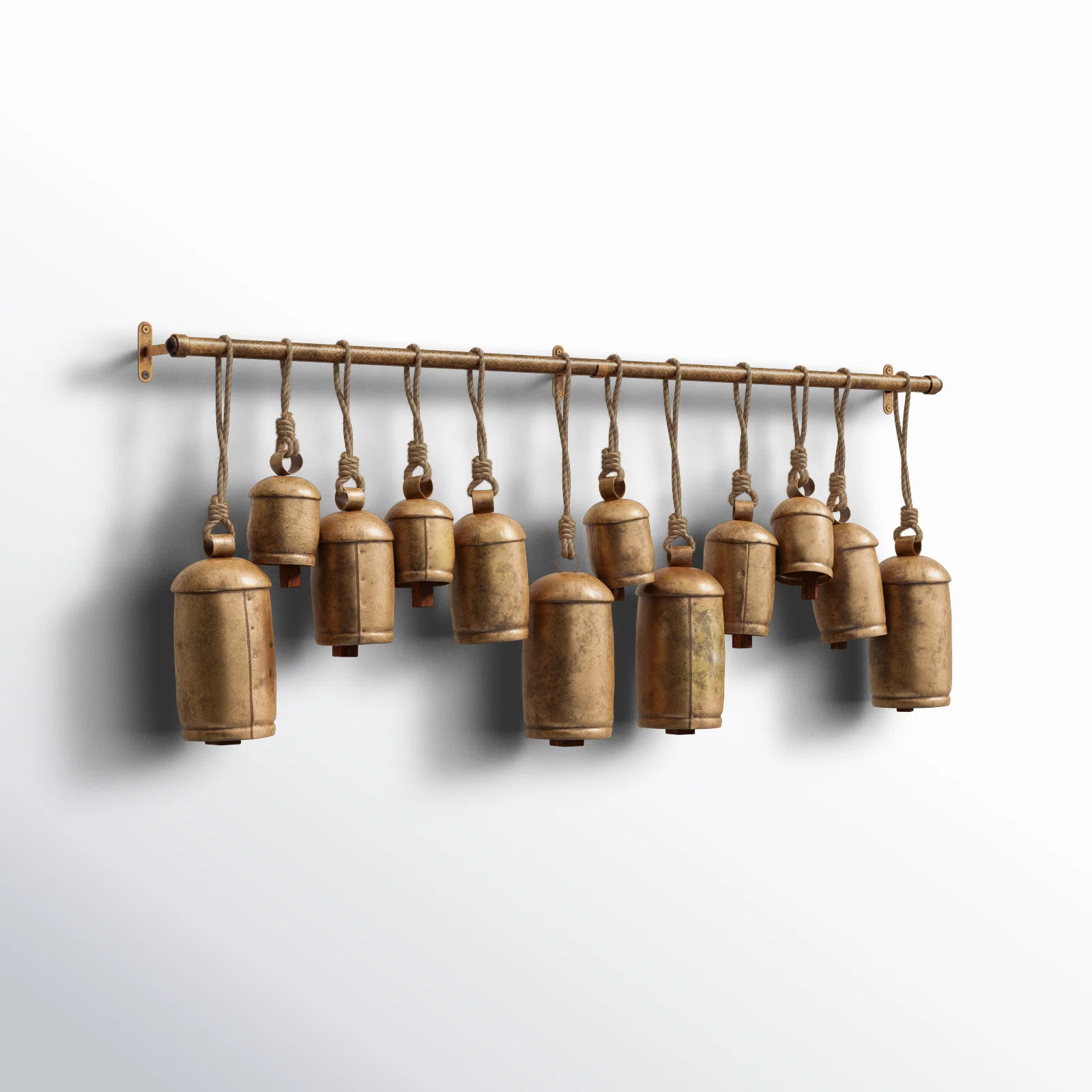 Kristen Metal Tibetan Inspired Decorative Cow Bells with 12 Bells on Jute Hanging Ropes and Rod | Wayfair North America