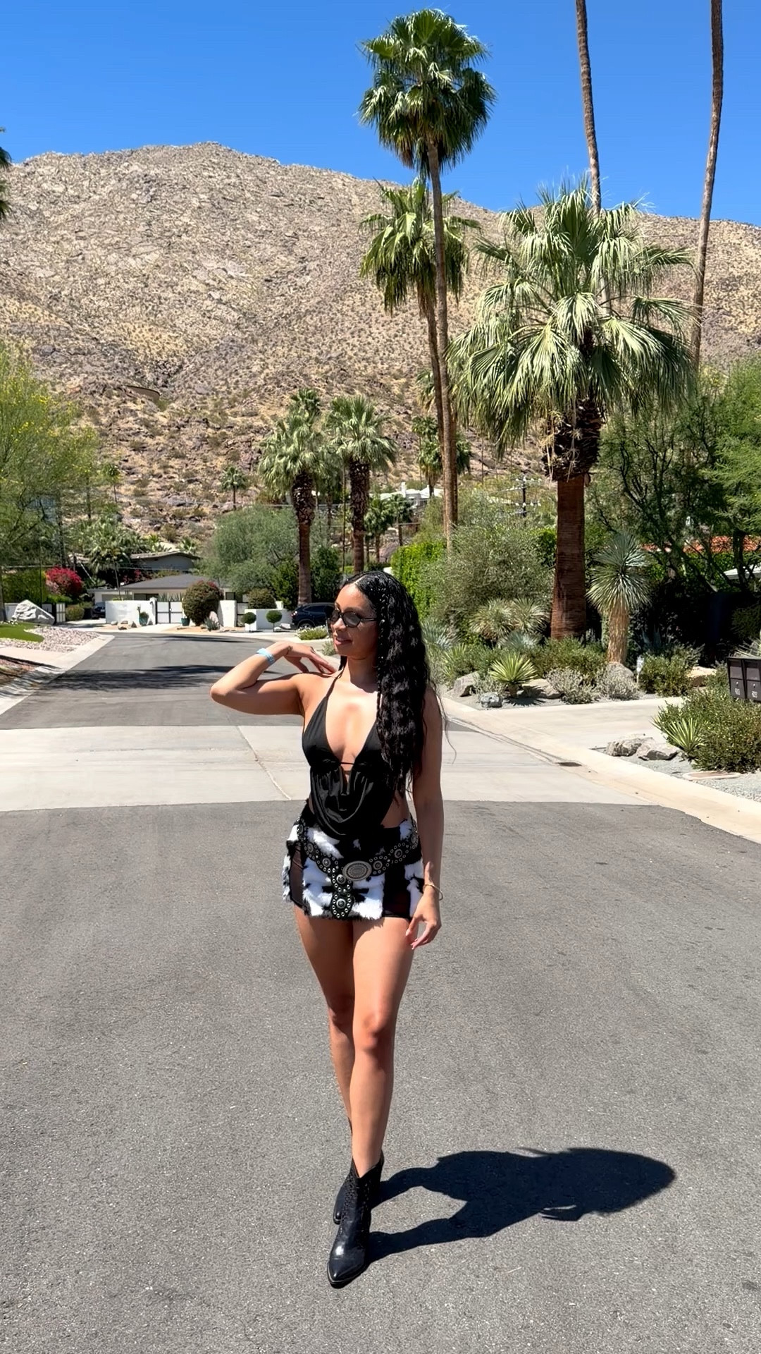 Coachella Weekend 1 🎡✨ All black outfit + furry cow print skirt from a local rave shop 🖤

#LTKFestival #LTKdayinmylife #LTKootd